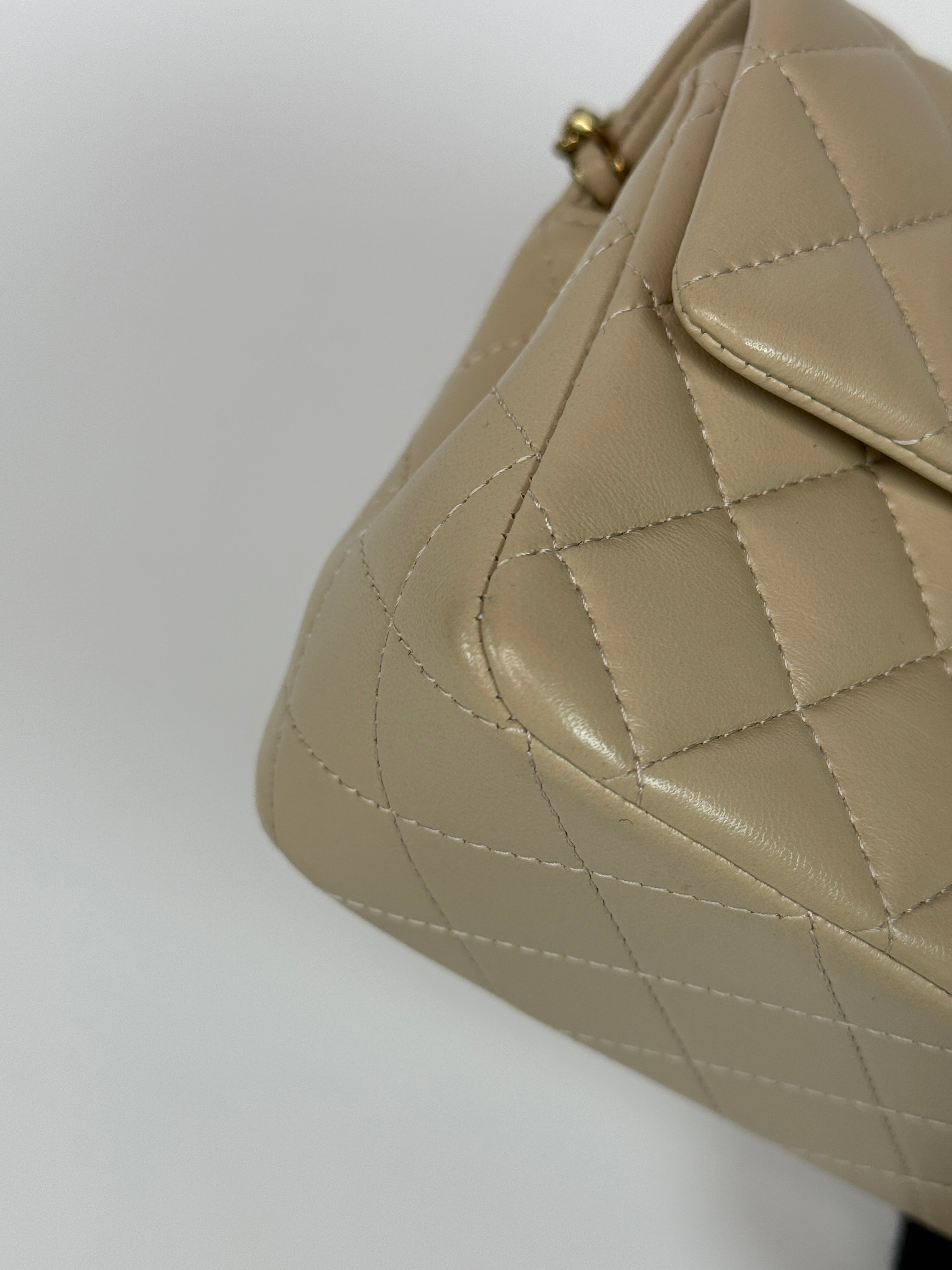 Authentic and preloved Chanel Mini Rectangle Top Handle In Ecru Lambskin With Gold Hardware in excellent condition, Fully insured next day delivery. Verified by Luxe Cheshire. 100% Authenticity guarantee,