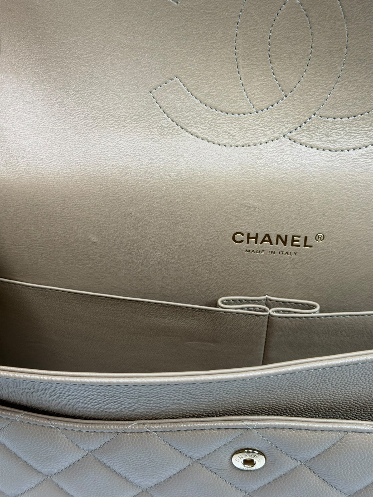 Chanel Maxi Flap In Beige Caviar Leather With Gold Hardware. 100% authentic and pre loved in excellent condition.