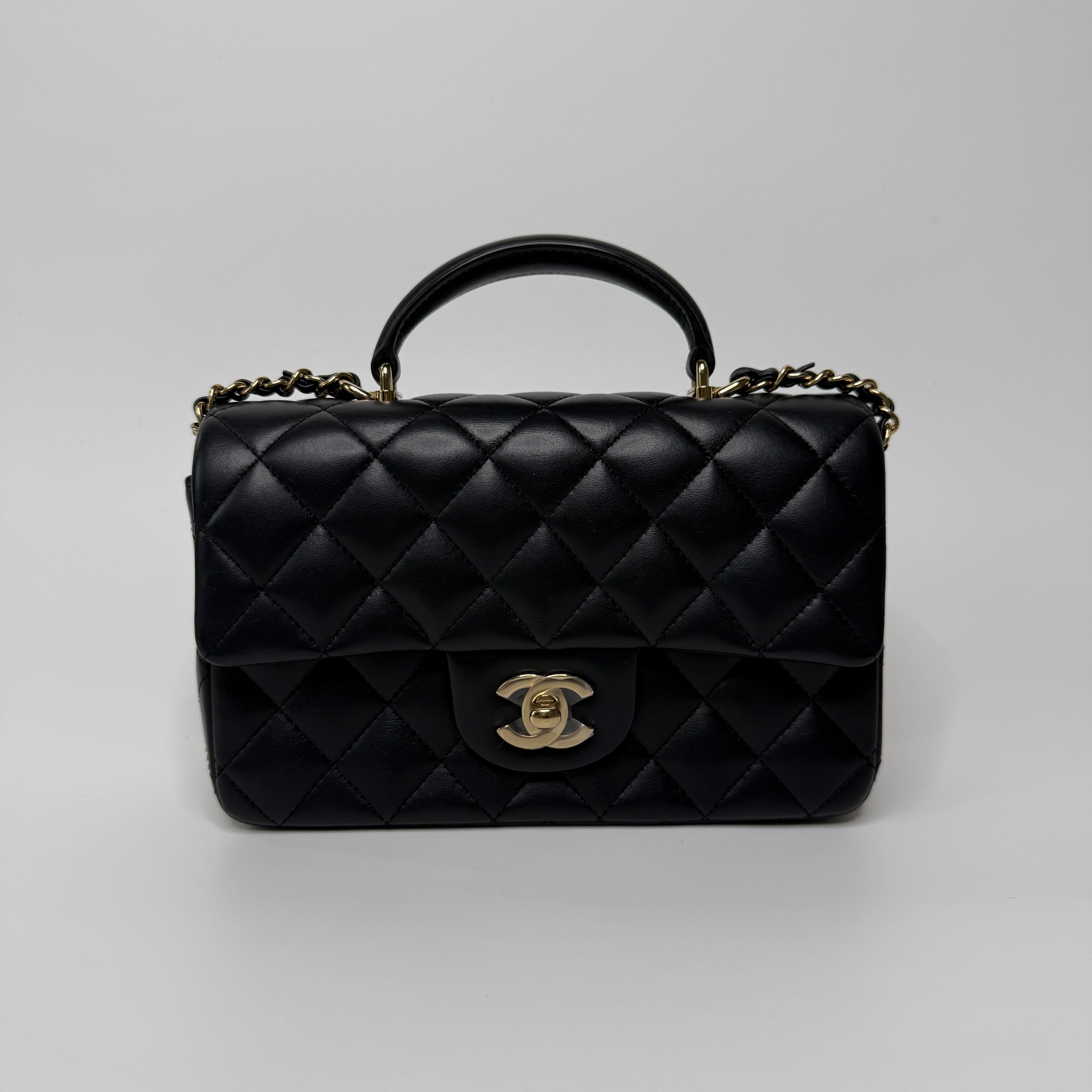 Chanel Mini Rectangle Top Handle Flap Bag In Black Lambskin With Pale Gold Hardware