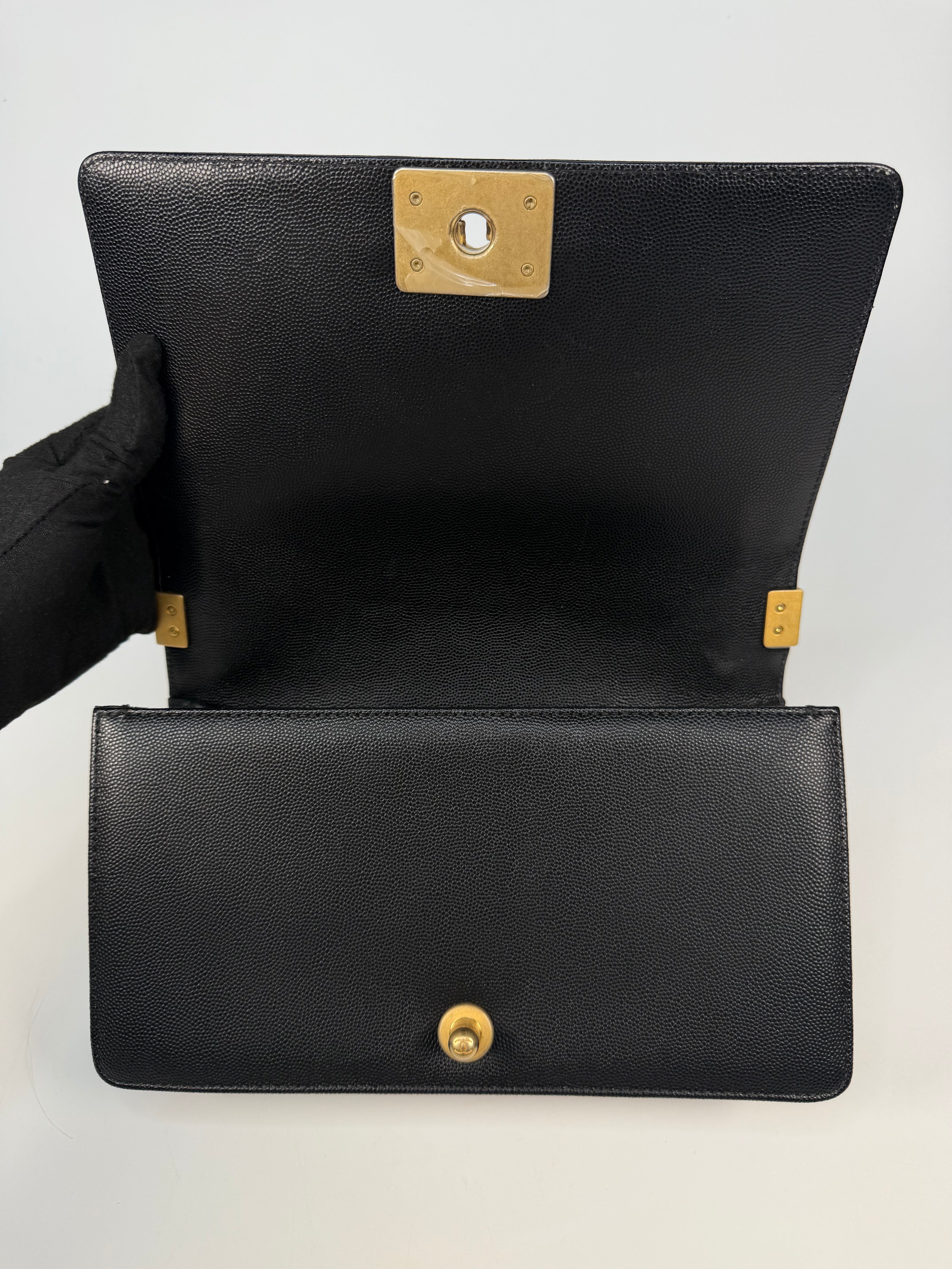 Chanel Boy Bag In Black Caviar Leather With Gold Hardware. Authentic and preloved in excellent condition. Insured next day delivery. Verified by Luxe Cheshire