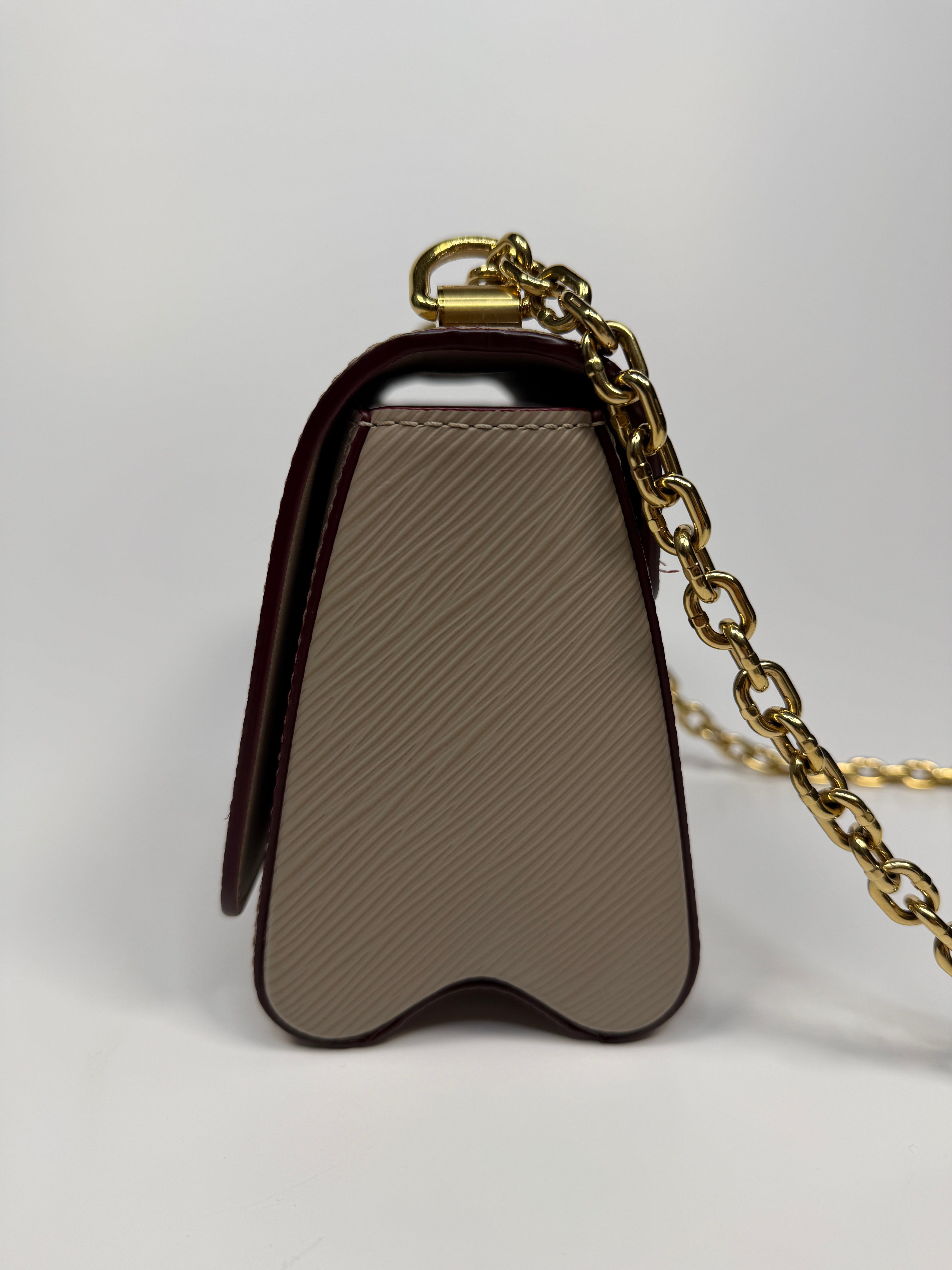 Louis Vuitton Twist PM Shoulder Bag In Beige leather with gold hardware. Authentic and pre loved excellent condition