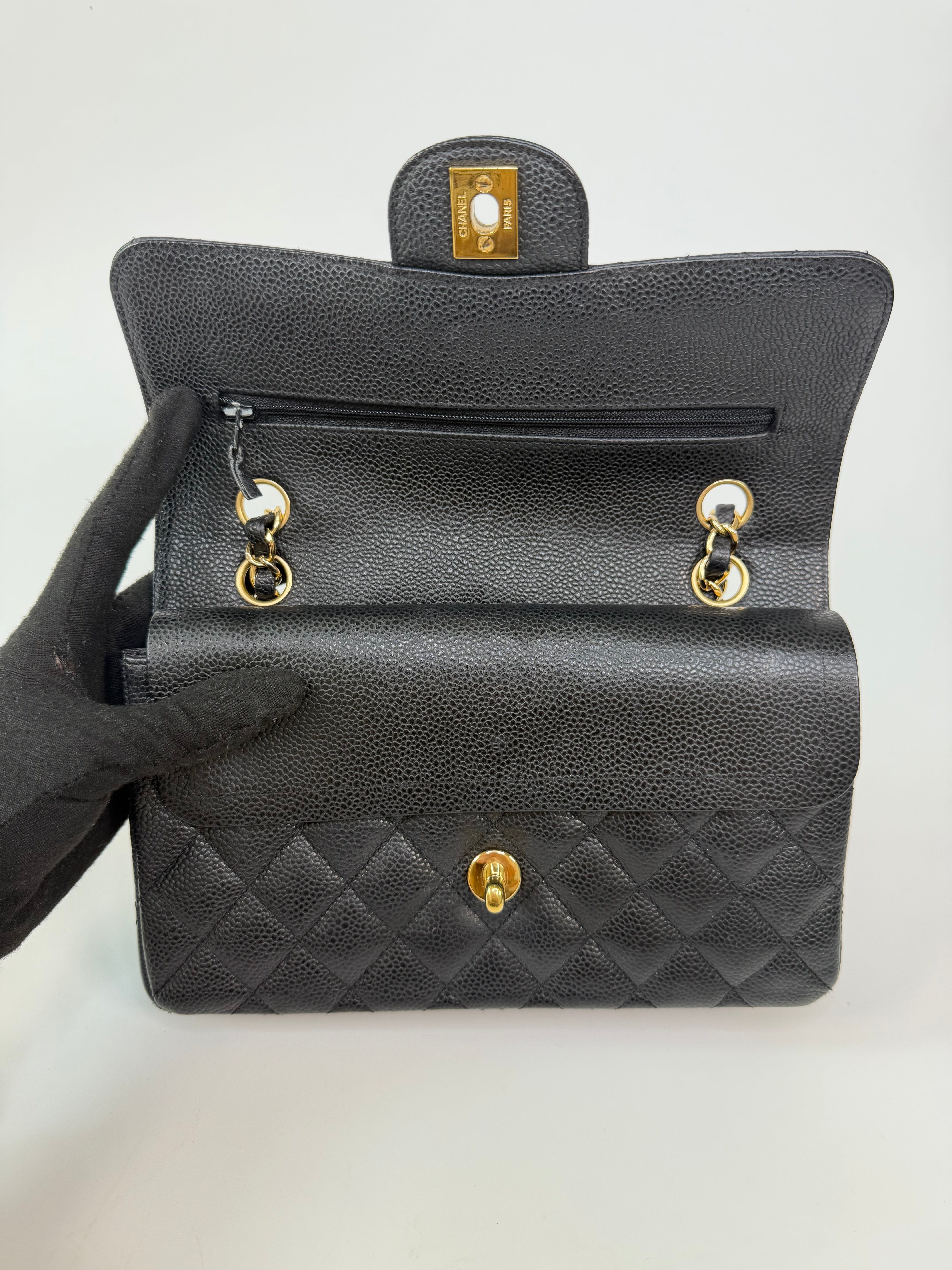 Chanel Small Classic Double Flap In Black Caviar Leather With Gold Hardware. 100% authentic and preloved in excellent condition