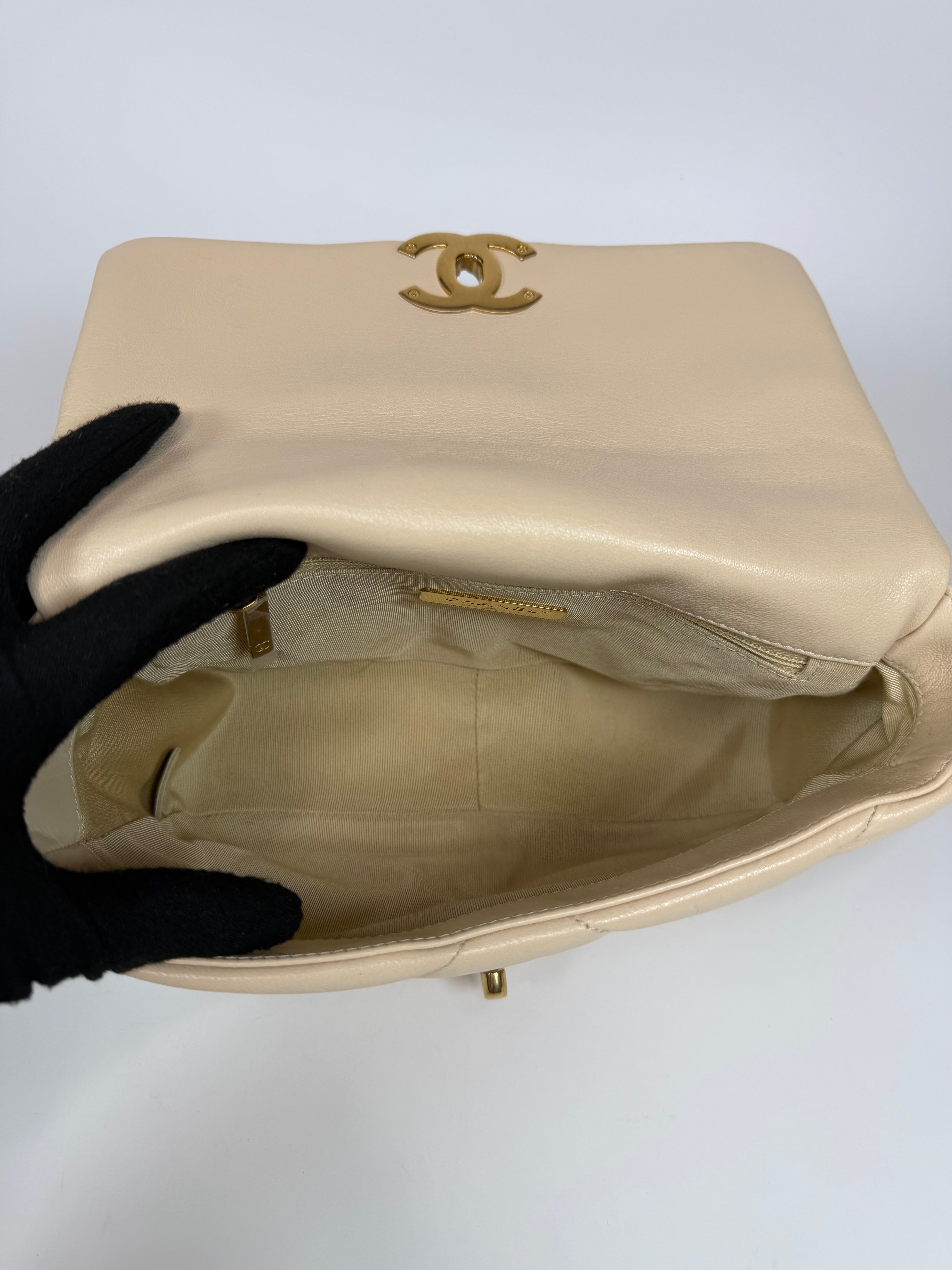 Chanel 19 Small In Beige Leather With Mixed Hardware. Authentic and preloved in excellent condition. Verified by Luxe Cheshire.