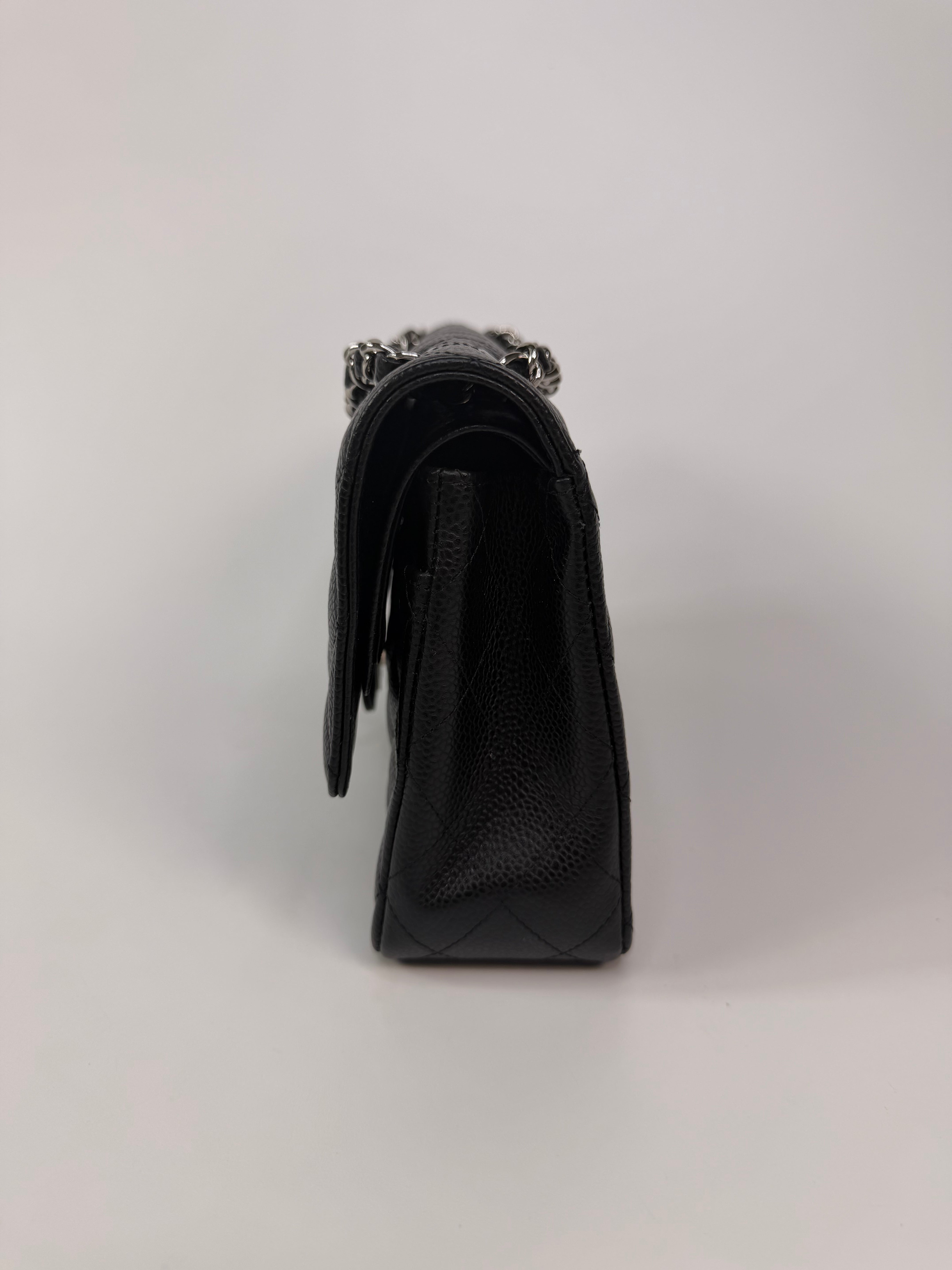 Chanel Vintage Medium Classic Double Flap Black Caviar Silver Hardware. 100% authentic and preloved in excellent condition