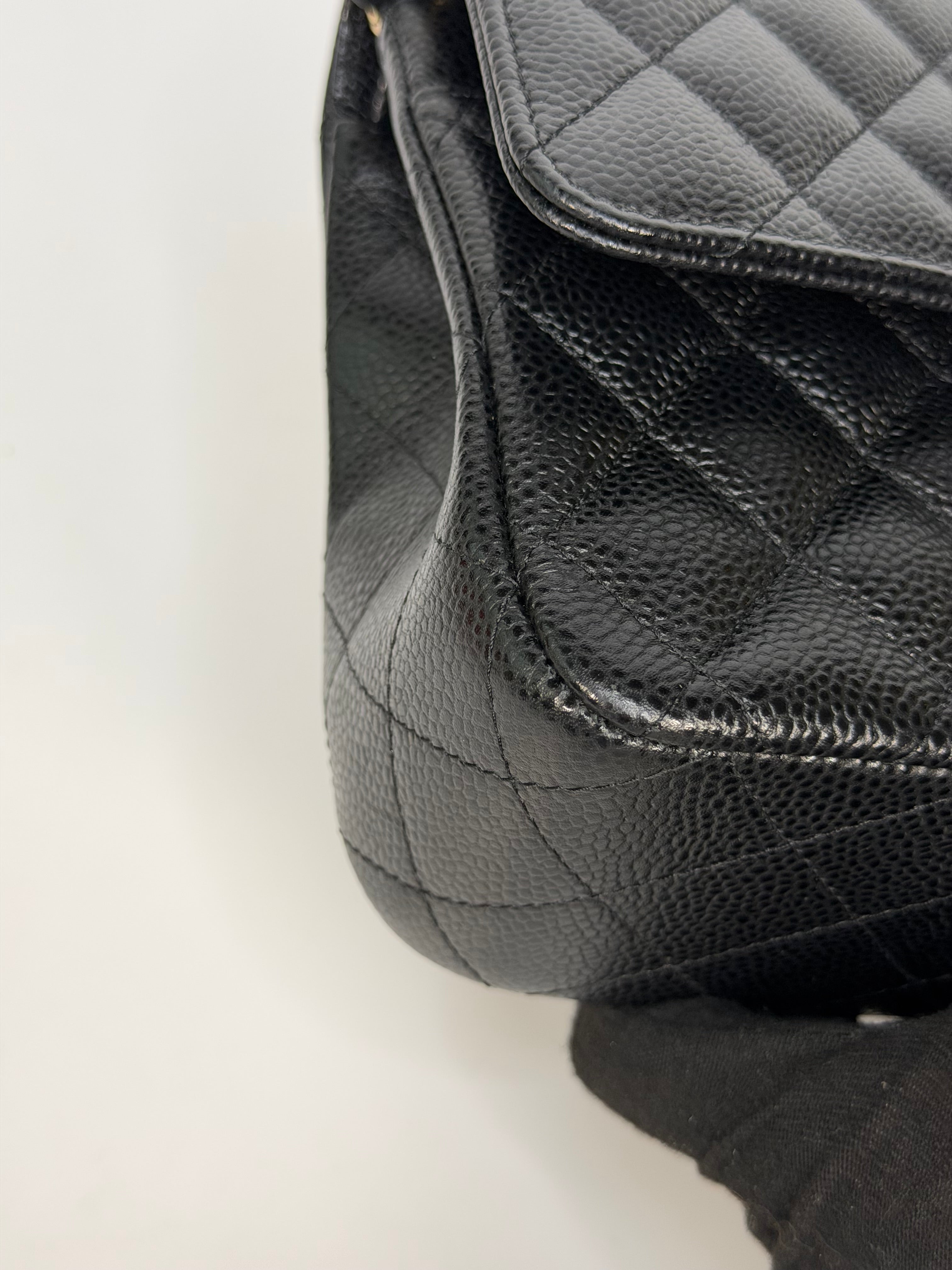 Chanel Medium Classic Double Flap In Black Caviar With Gold Hardware. Authentic and preloved in new and unused condition.
