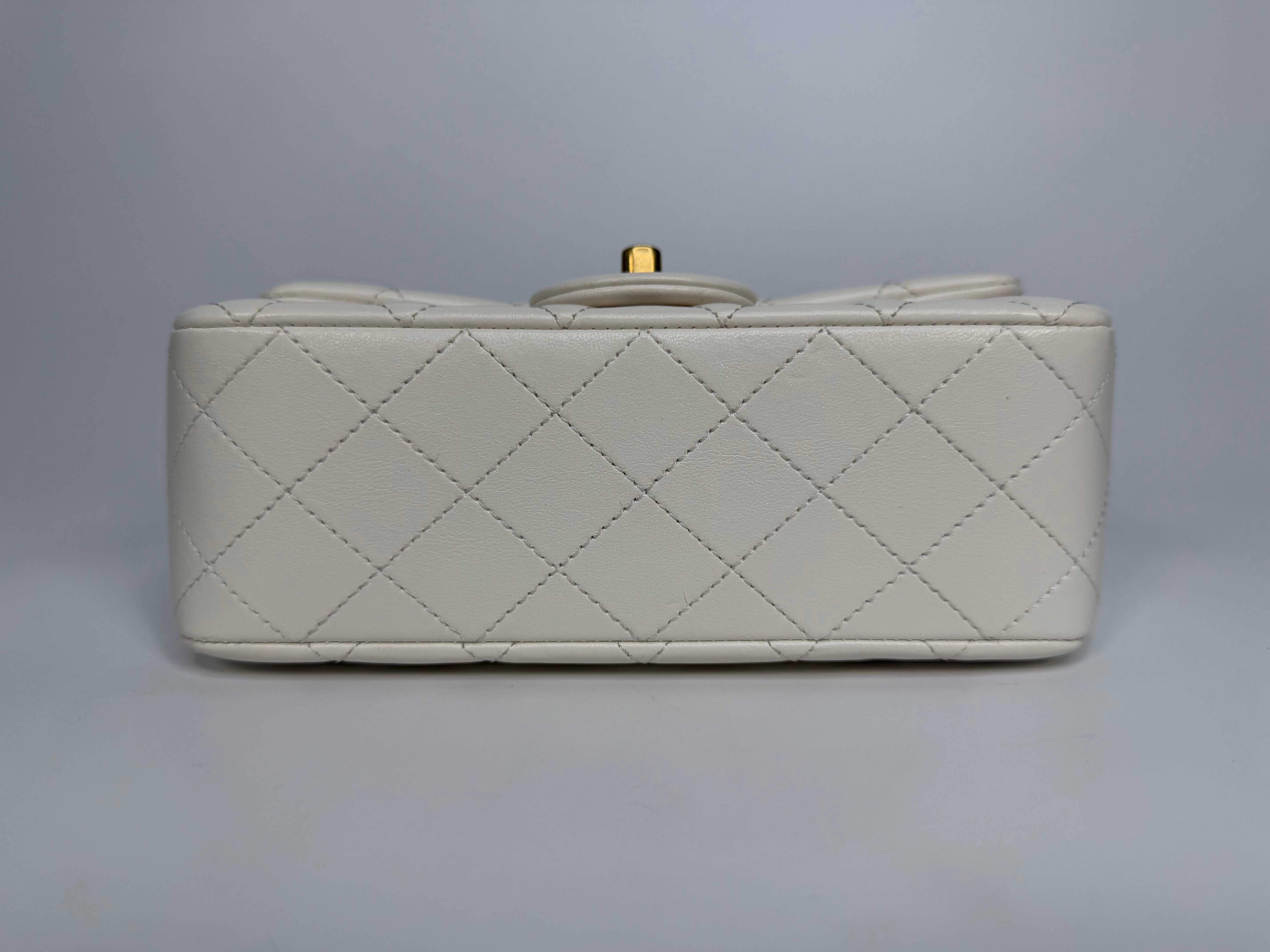 Chanel Pearl Crush Mini Rectangle In White Lambskin Leather Gold Hardware. Authentic and preloved in excellent condition with 100% authenticity guarantee.