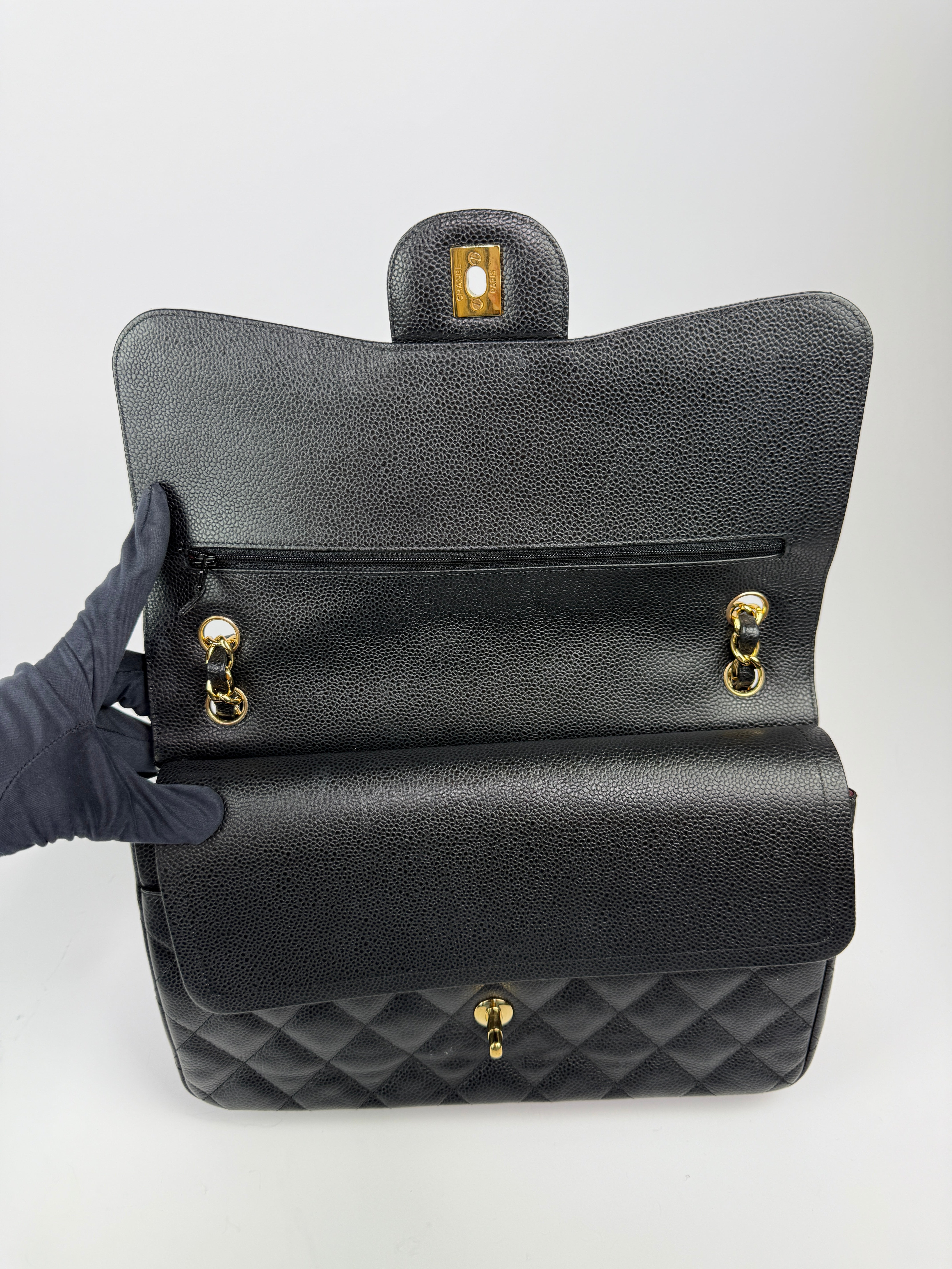 Chanel Jumbo Classic Double Flap In Black Caviar Gold Hardware
Pre Loved & Authentic