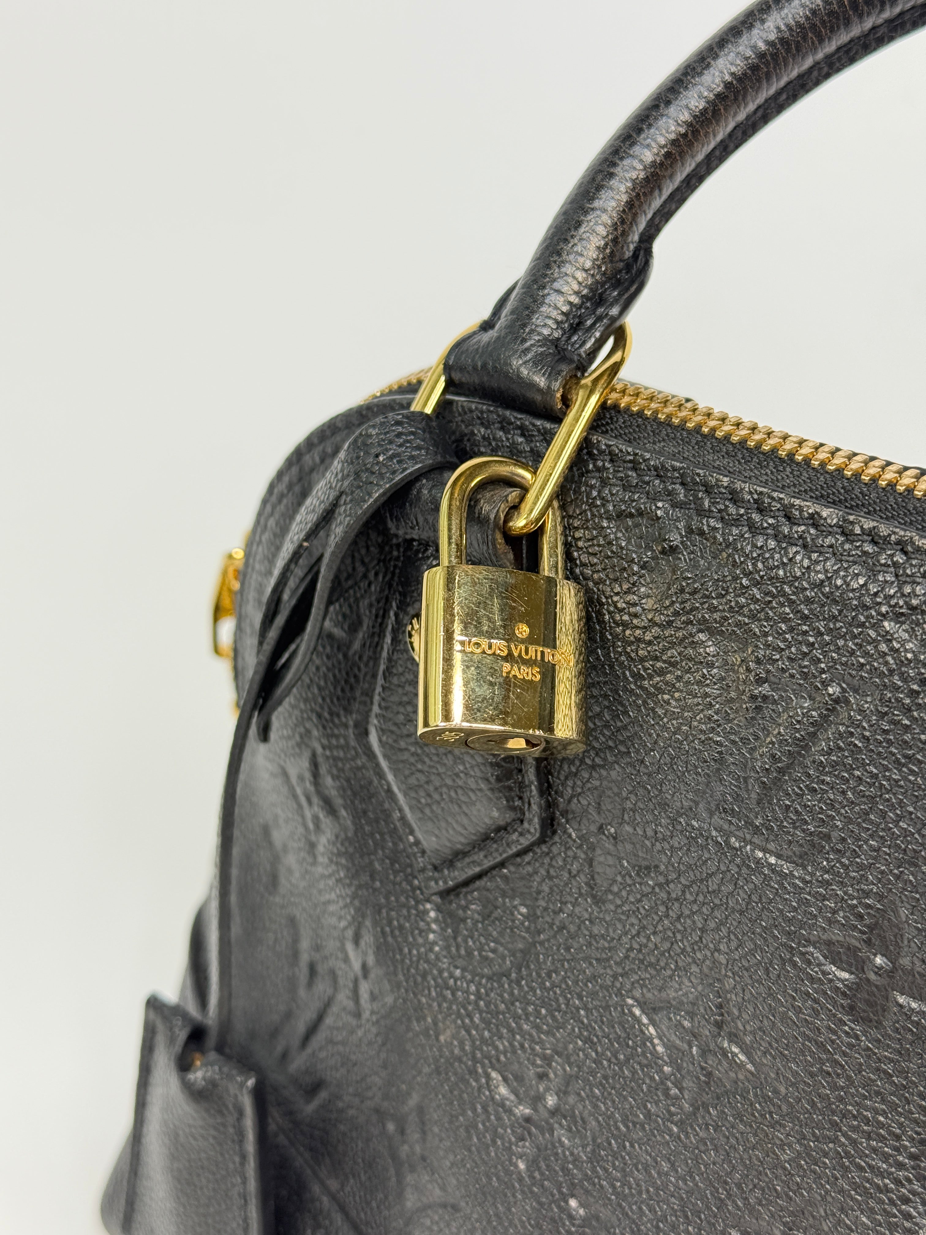 Authentic and preloved Louis Vuitton Alma BB In Empreinte Black Monogram With Gold Hardware