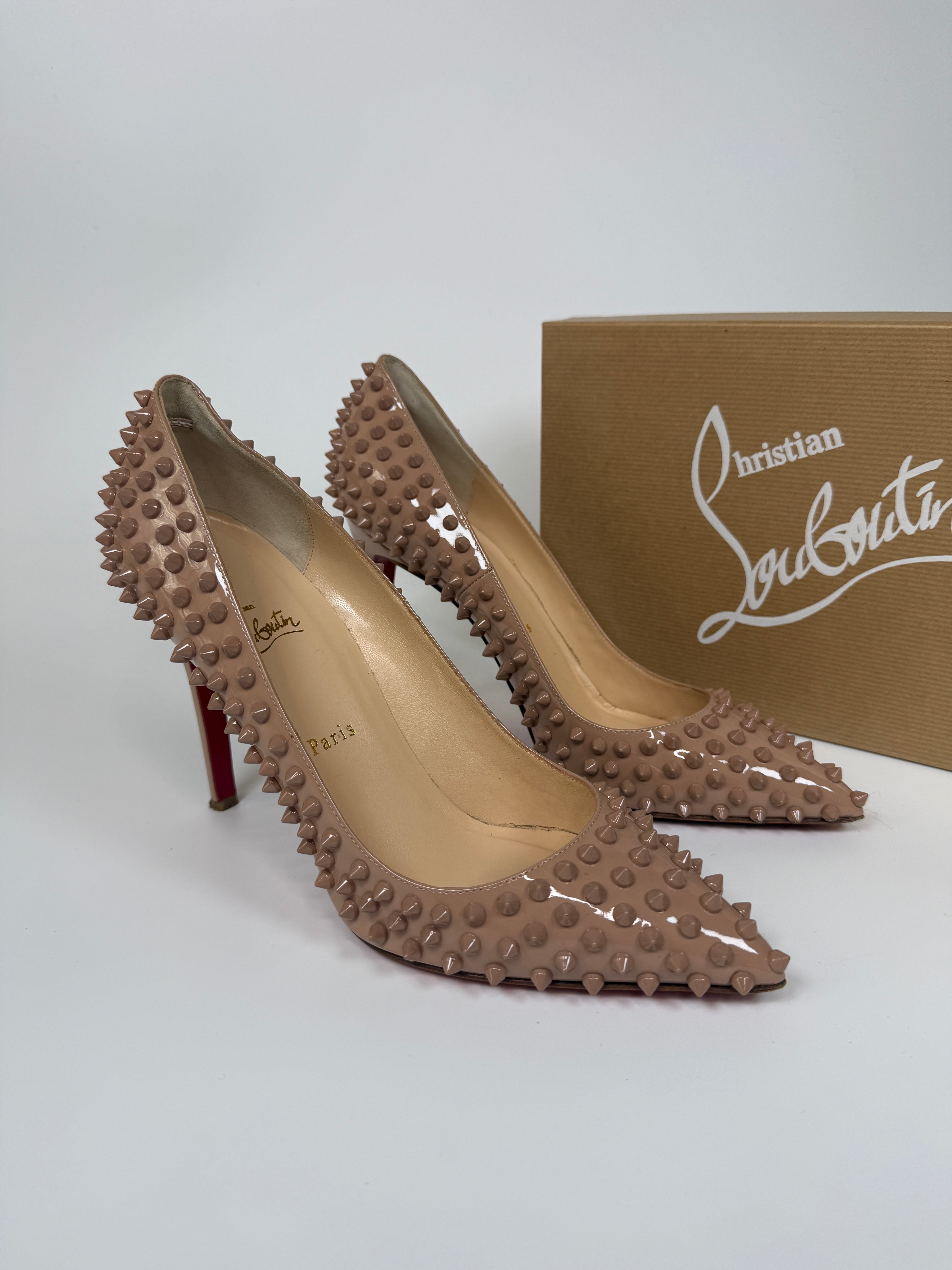 Authentic and preloved Christian Louboutin Nude Spike Pigalle 100 Heels (Size 41.5/UK8.5) Very Good condition. 100% Authenticity Guarantee