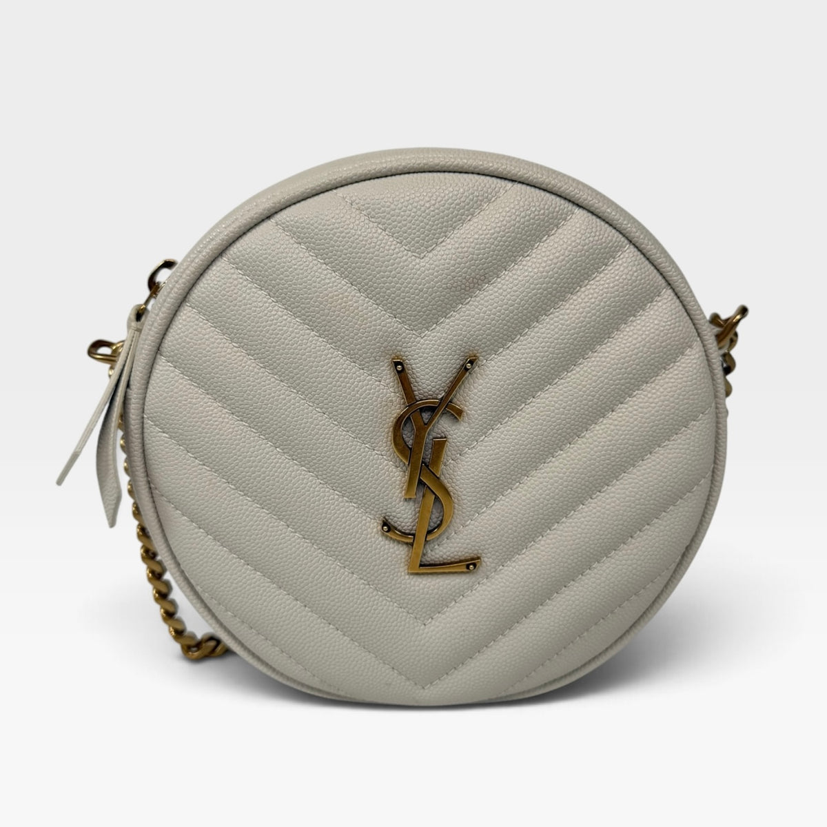 Saint Laurent Vinyle Round Bag In Stone Matelasse Chevron With Gold Hardware. 100% authentic and preloved in excellent condition