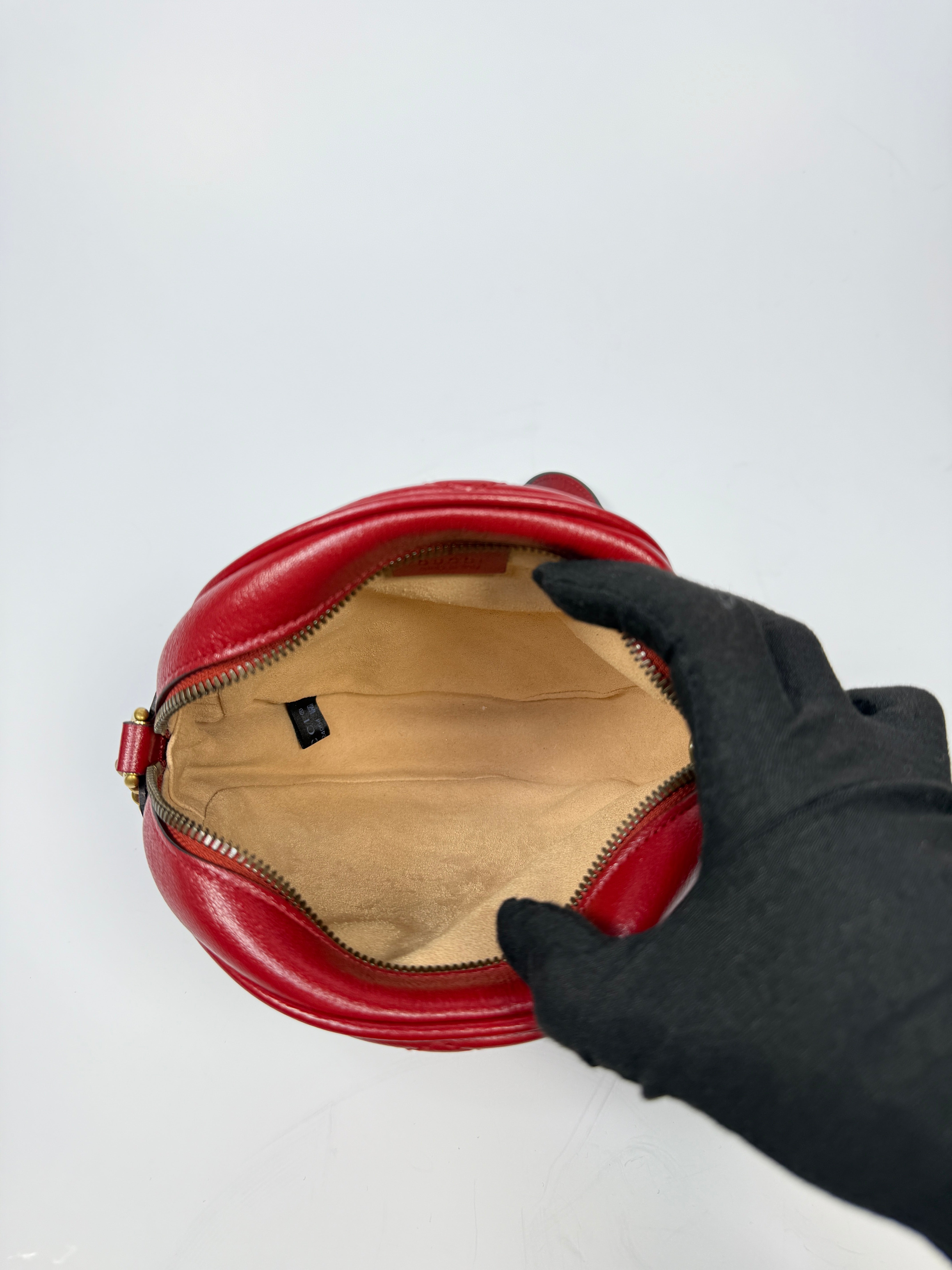 Gucci GG Marmont Round Shoulder Bag In Red Leather, very good condition. Authentic and preloved. 100% Authenticity guarantee