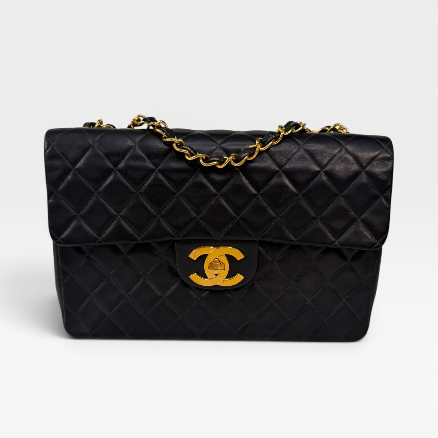 Chanel Vintage XL Maxi Flap Bag In Black Lambskin Gold Hardware. 100% authentic and preloved in excellent condition