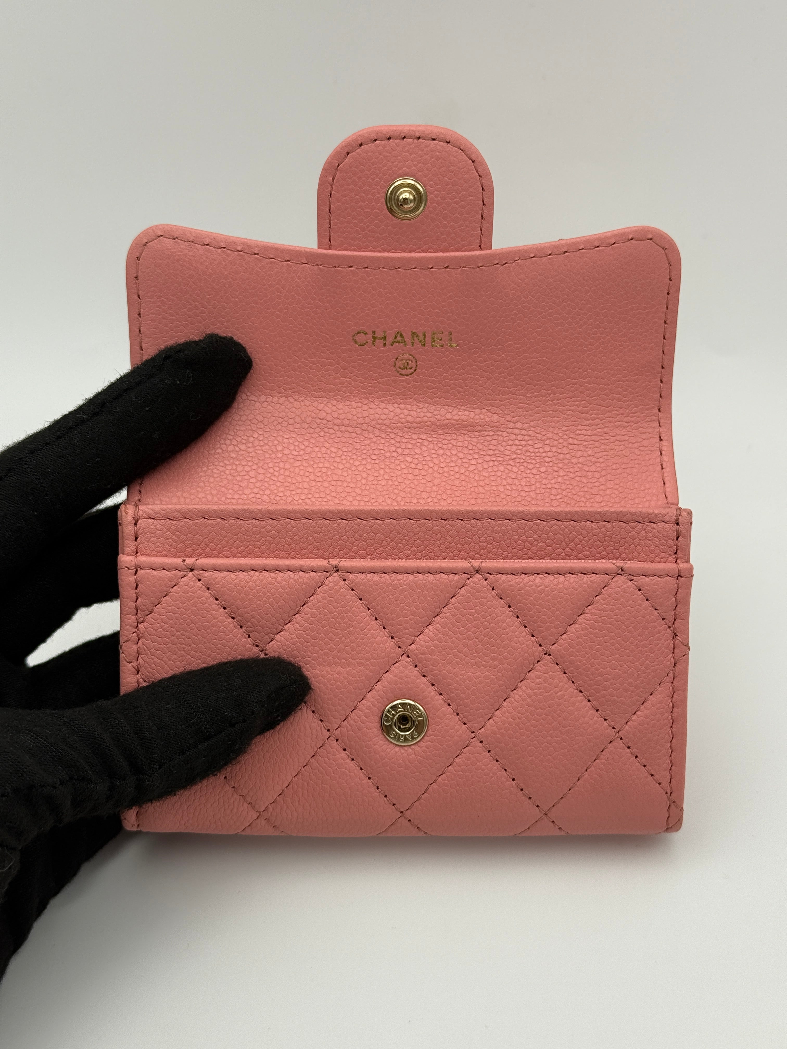 Authentic and preloved Chanel Classic Card Holder In Pink Caviar Leather With Gold Hardware. Excellent condition. 100% Authenticity guarantee