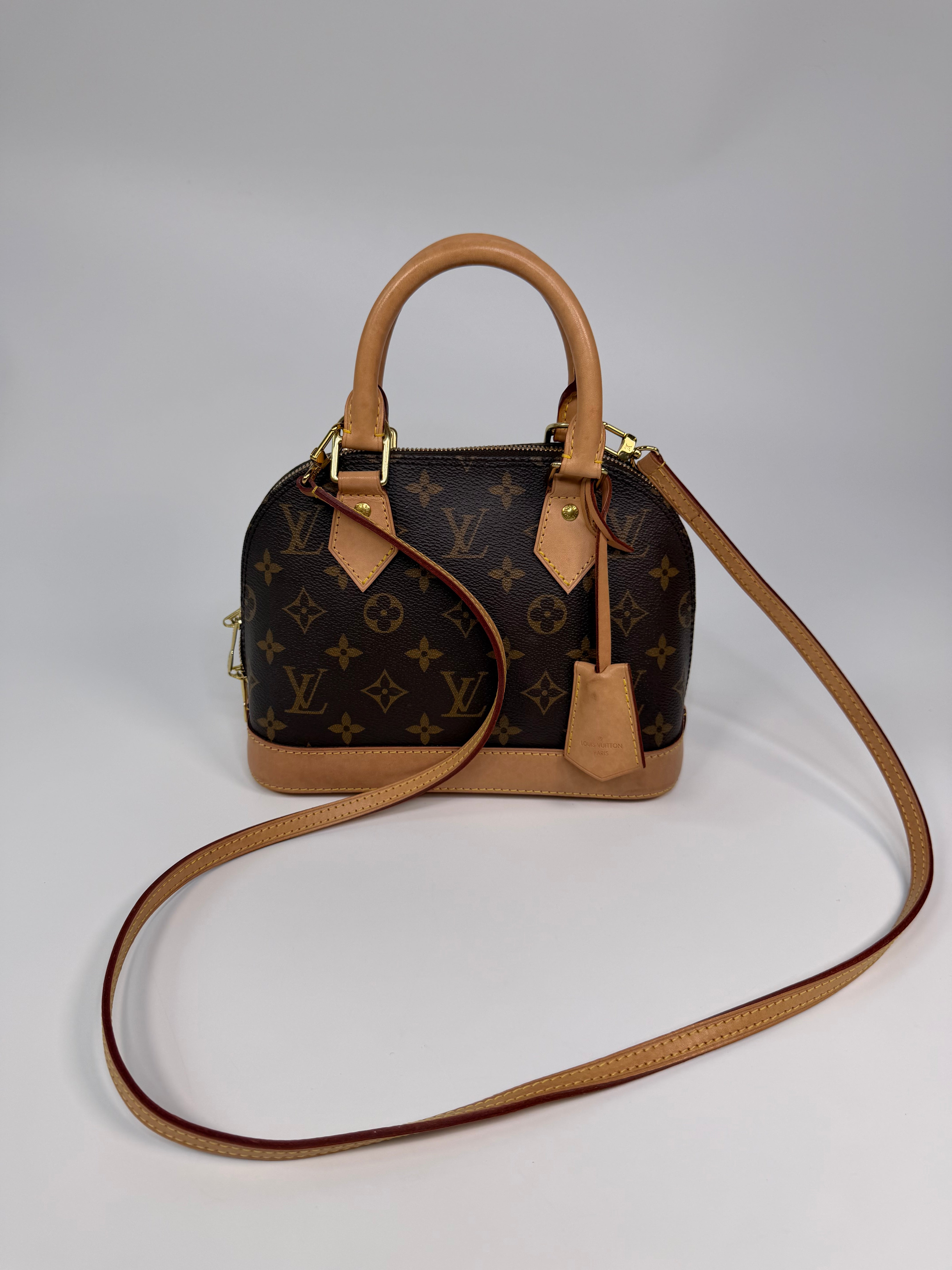 Louis Vuitton Alma BB In Brown Monogram Canvas With Gold Hardware. Authentic and preloved in very good condition