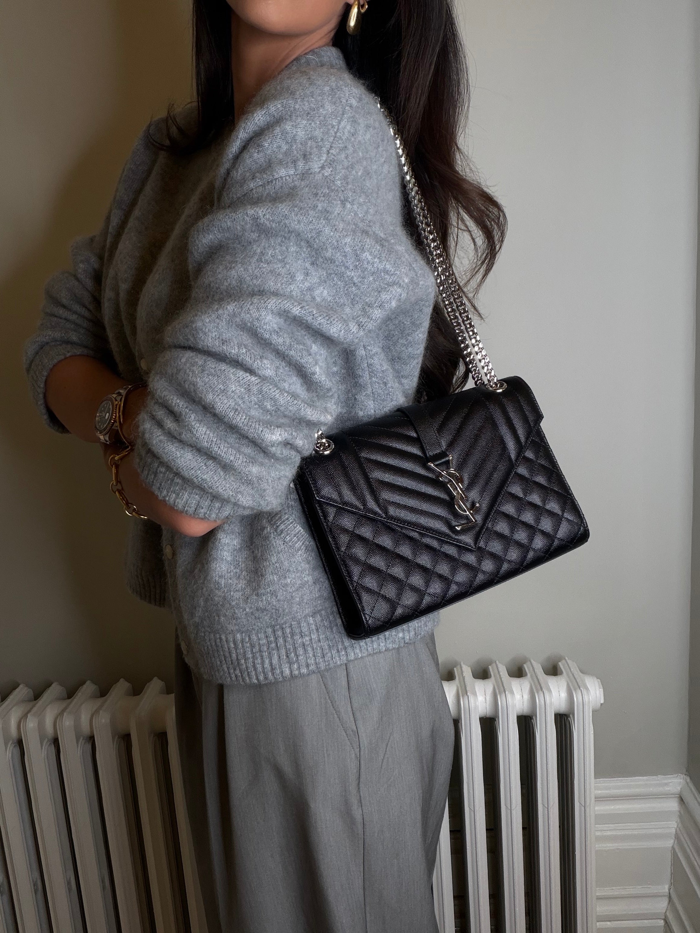 Saint Laurent Medium Envelope Bag In Blacked Grained Leather With Silver Hardware. Authentic and preloved. Excellent Condition