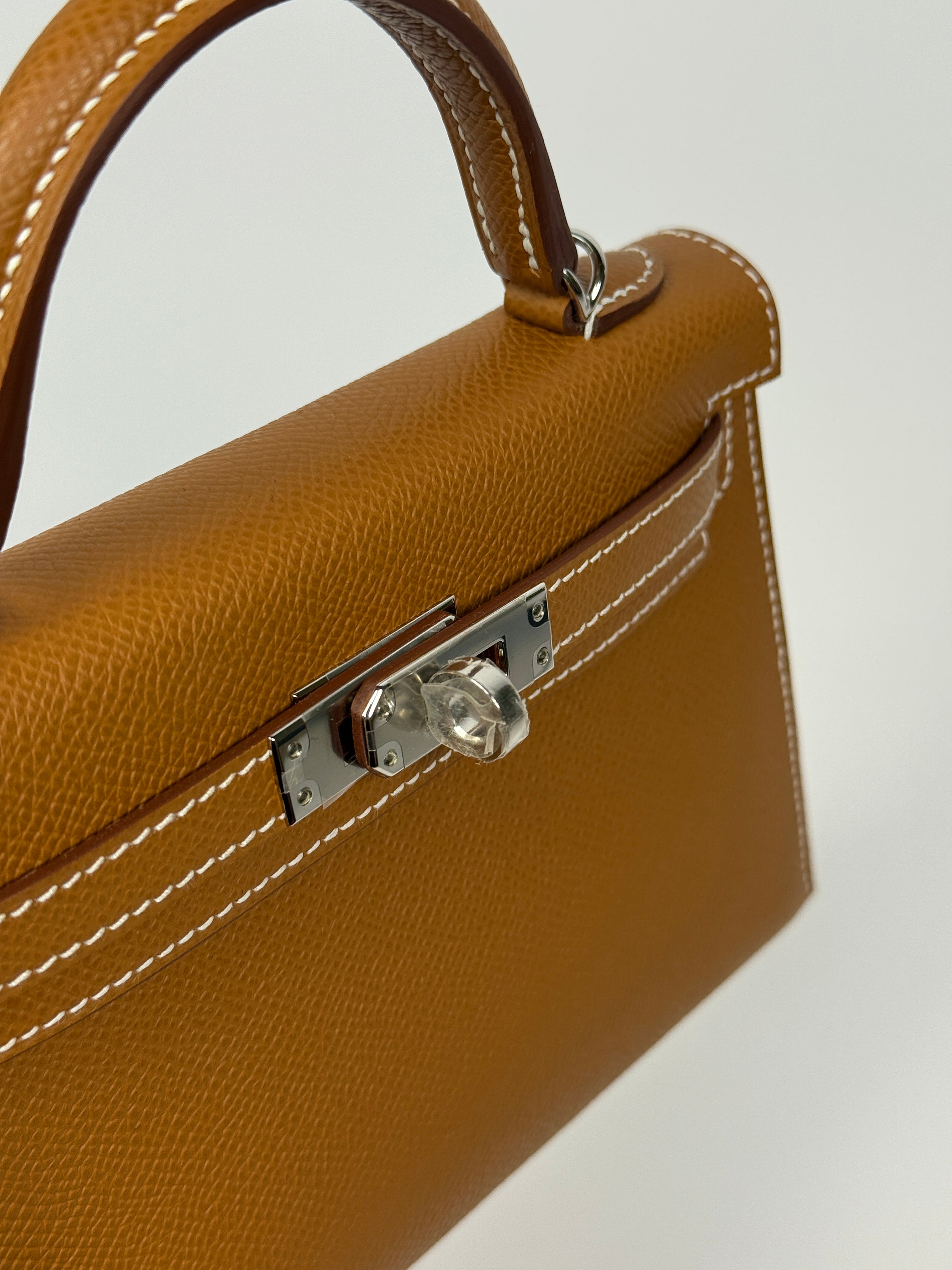 Hermès Mini Kelly Sellier In Gold Epsom Leather With Palladium Hardware New and unused Authentic and preloved