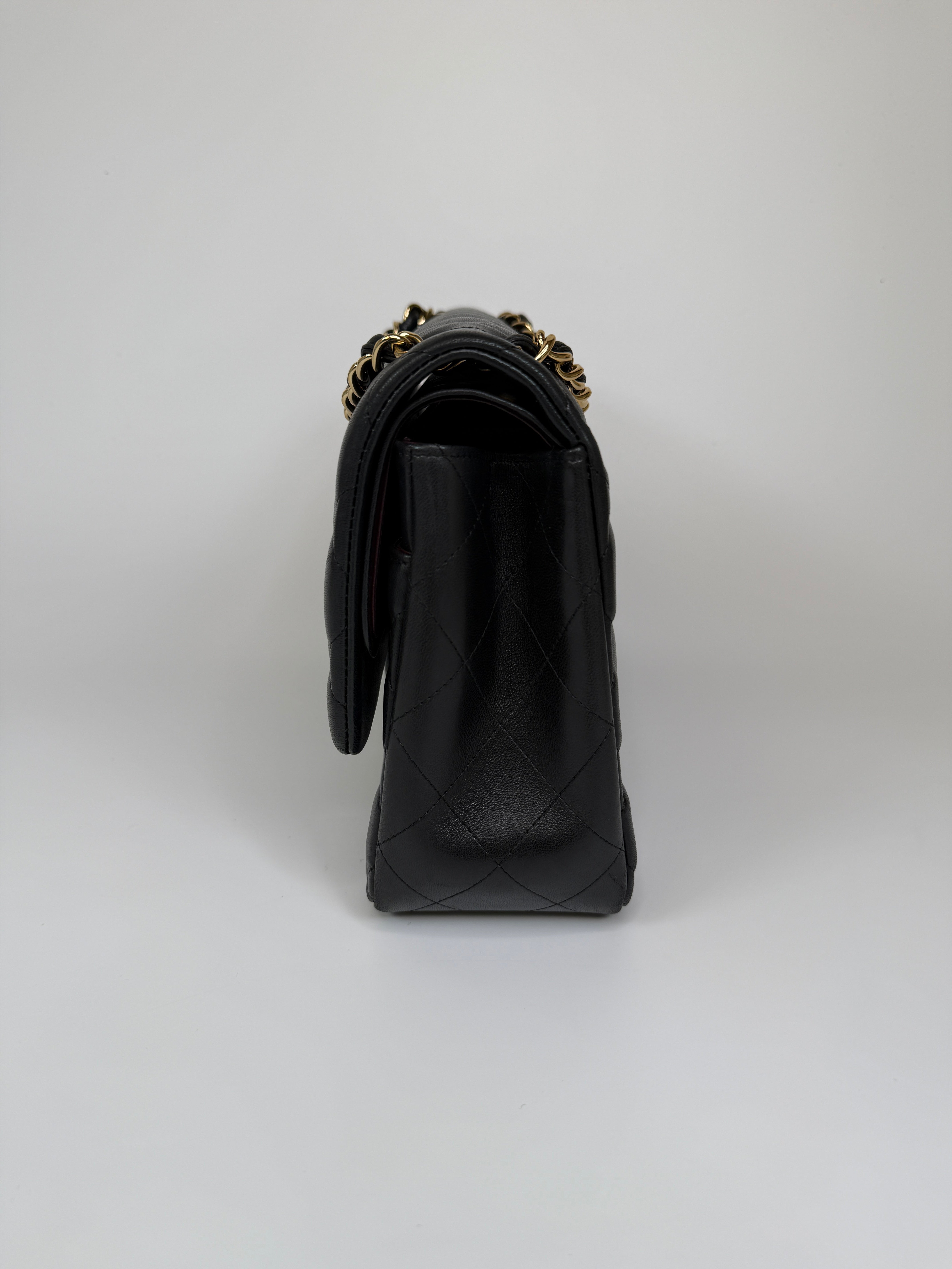 Authentic and preloved Chanel Jumbo Classic Flap Bag In Black Lambskin Leather With GOLD Hardware. Excellent condition. 100% Authenticity Guarantee