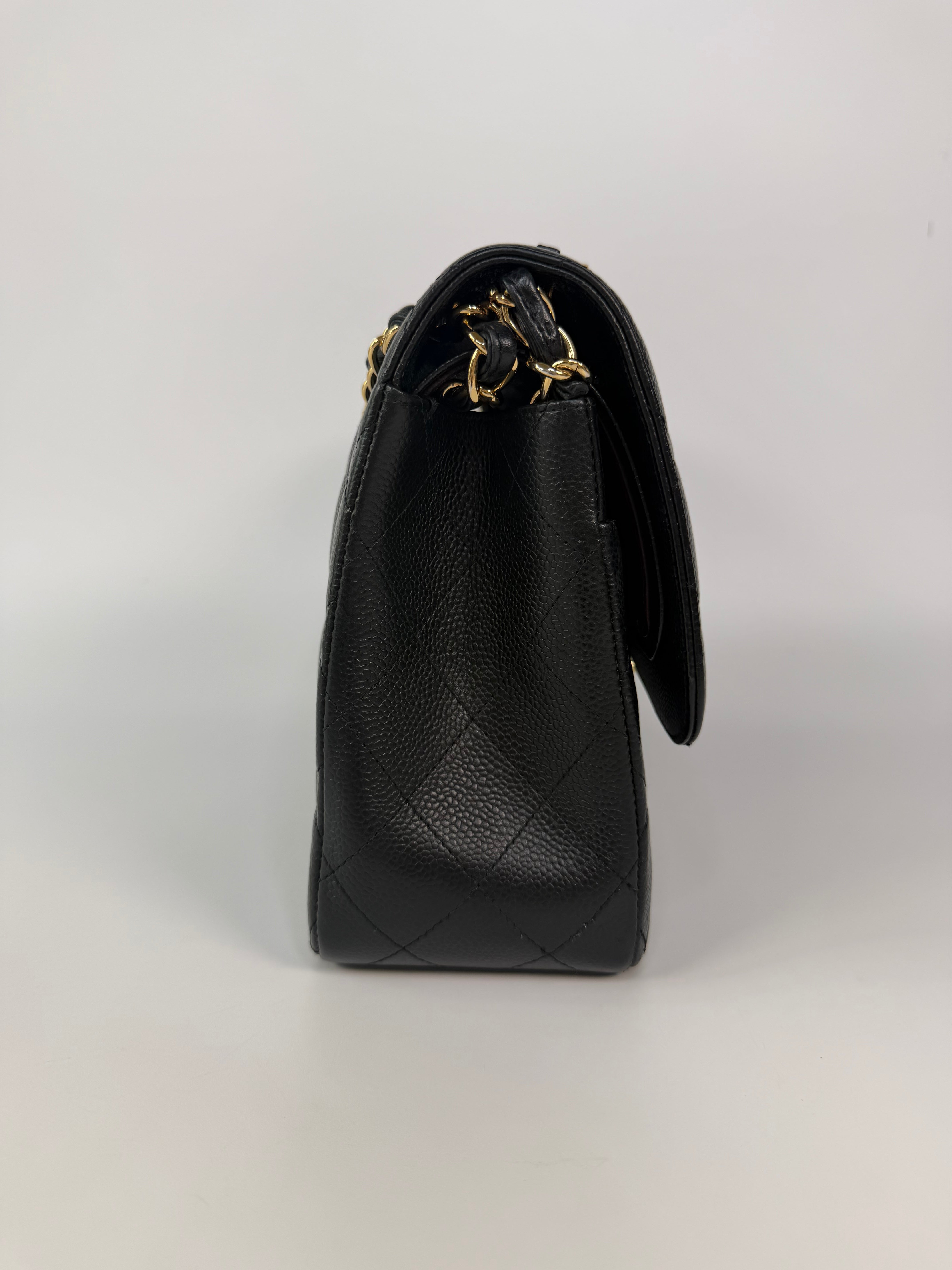 Chanel Jumbo Classic Flap Bag In Black Caviar Leather With Gold Hardware 100% authentic and preloved in excellent condition
