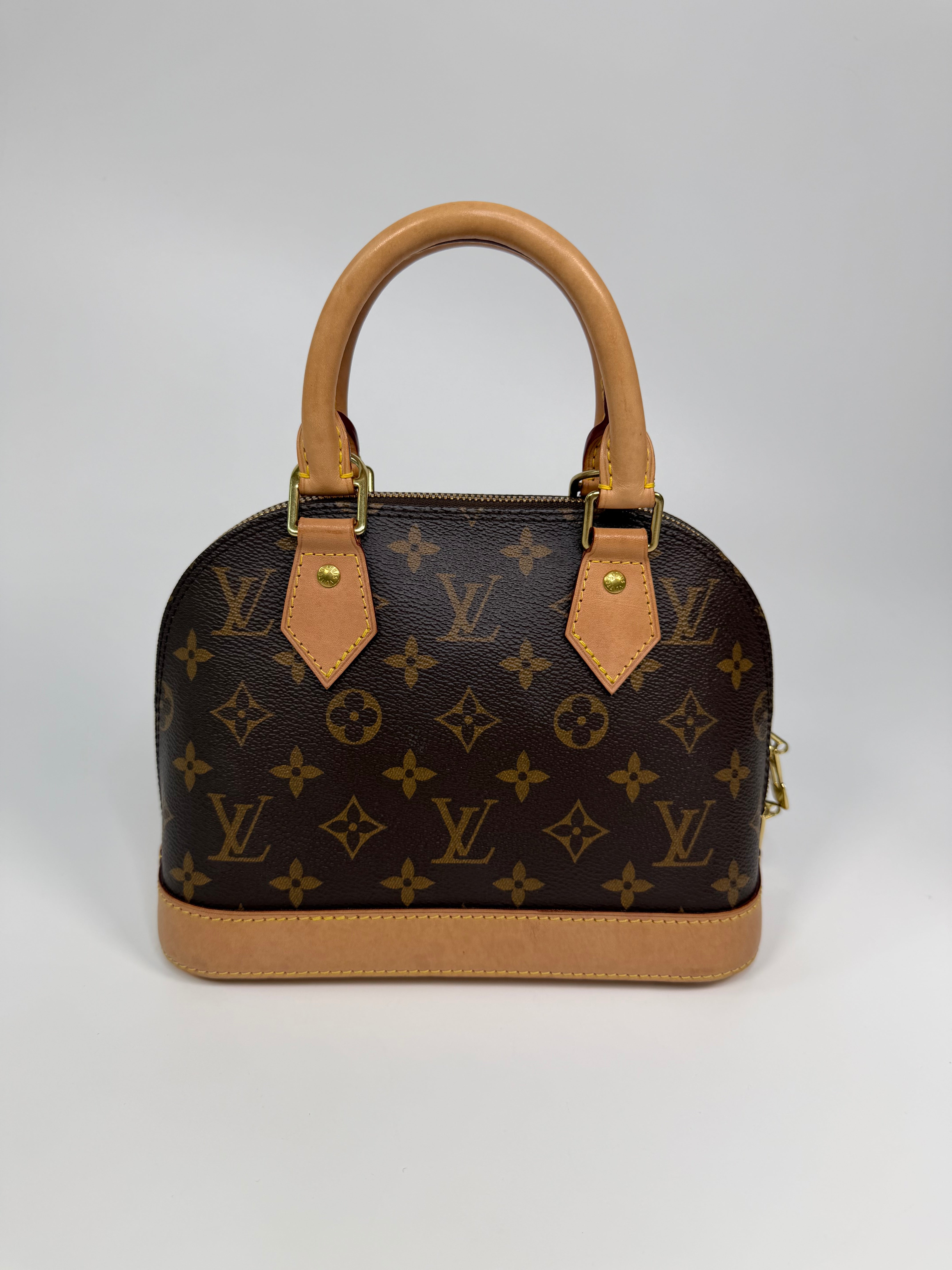 Louis Vuitton Alma BB In Brown Monogram Canvas With Gold Hardware. Authentic and preloved in very good condition
