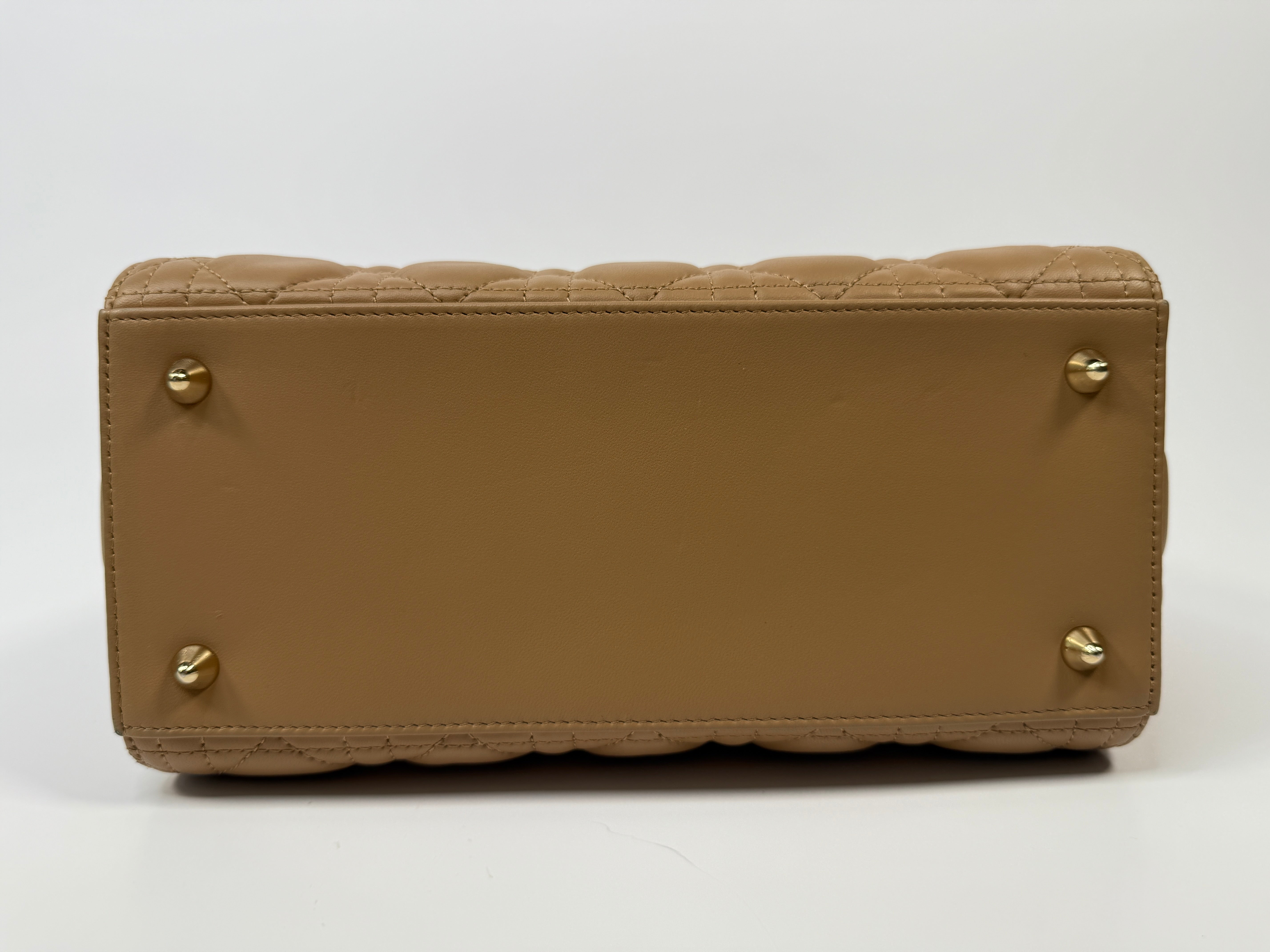 Authentic pre-loved Christian Dior Medium Lady Dior Bag in gold with gold hardware