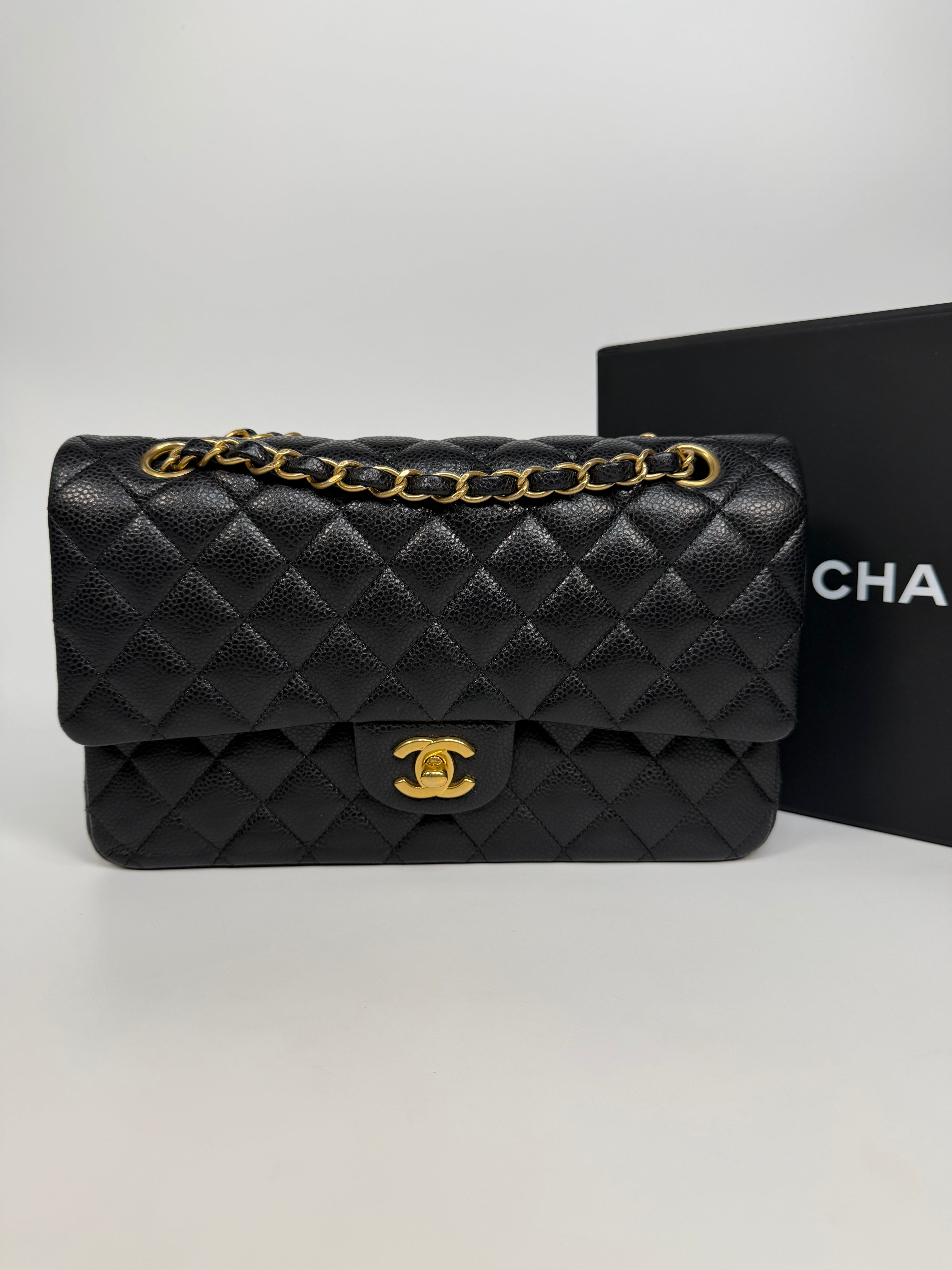 Chanel Medium Classic Double Flap Black Caviar Leather With Gold Hardware. Authentic and preloved in excellent condition