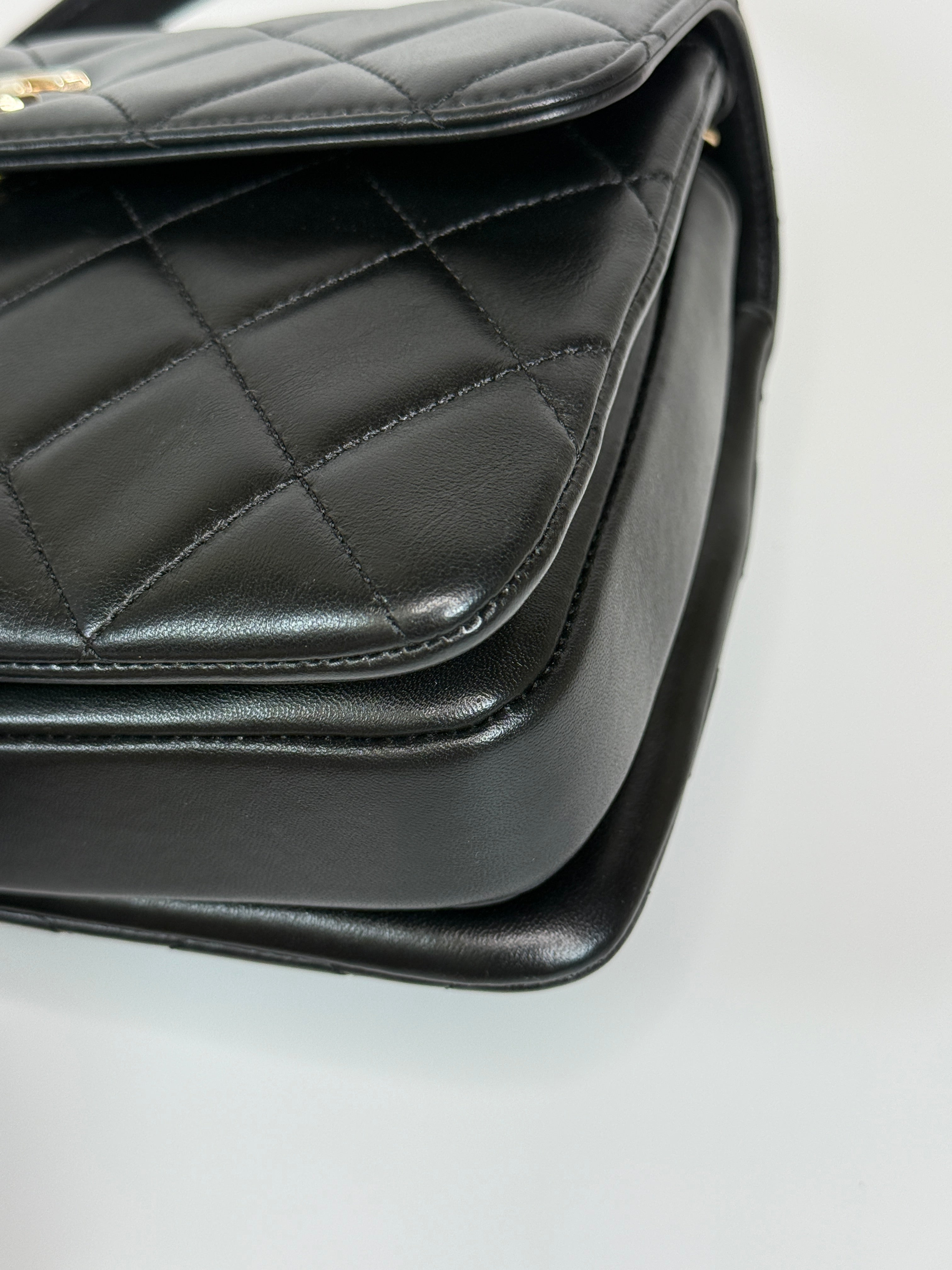 Authentic and preloved Chanel Trendy Top Handle Flap Bag In Black Lambskin With Gold Hardware. Excellent condition. 100% Authenticity guarantee