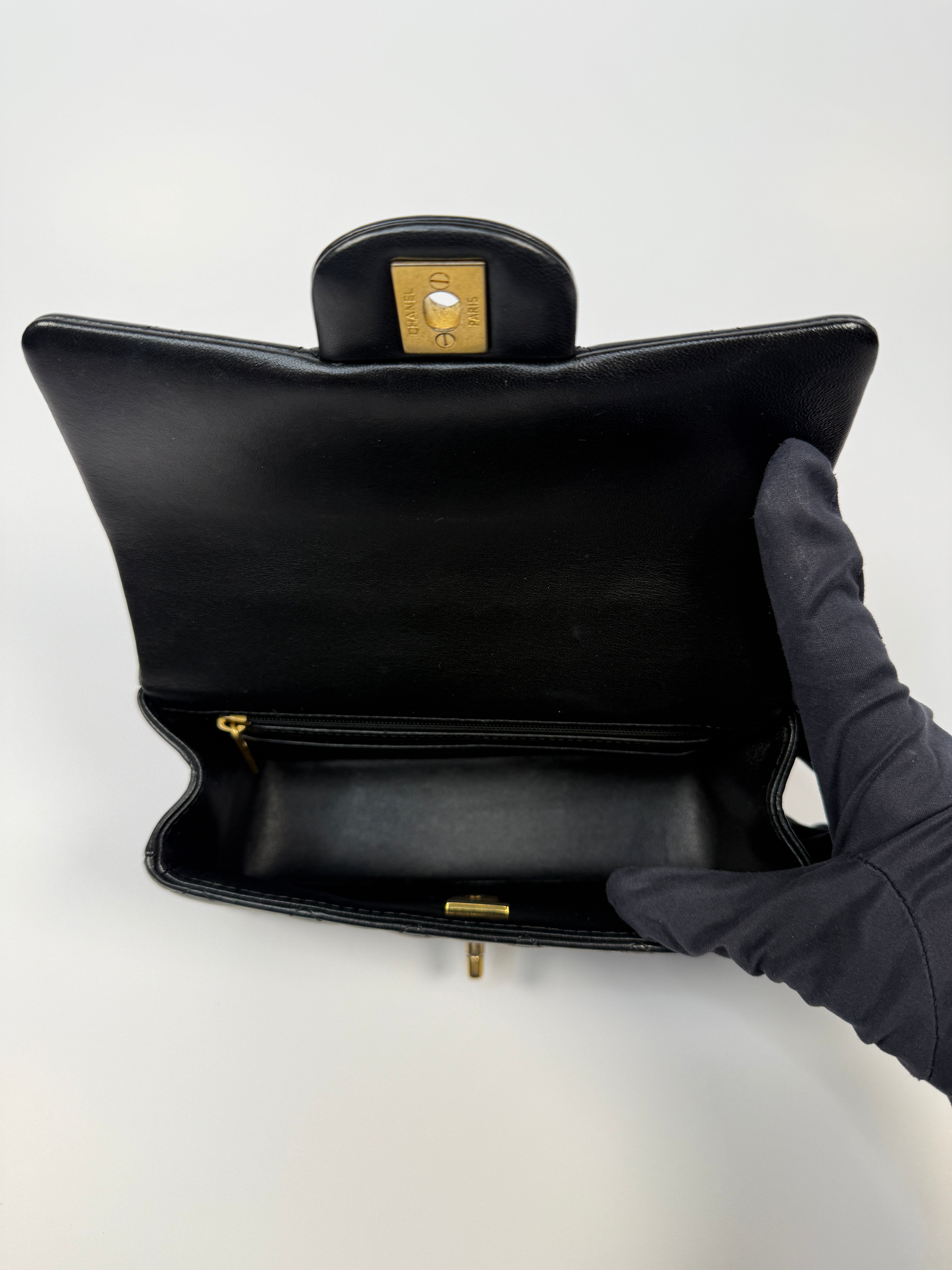 Chanel Mini Rectangle Top Handle Flap Bag In Black Lambskin With Gold Hardware
Pre Loved & Authentic