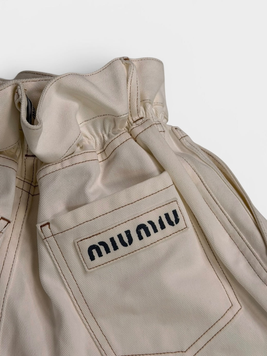 Miu Miu Paperbag Waist Shorts In Cream Denim (Size 38/UK6) 100% authentic and preloved in excellent condition