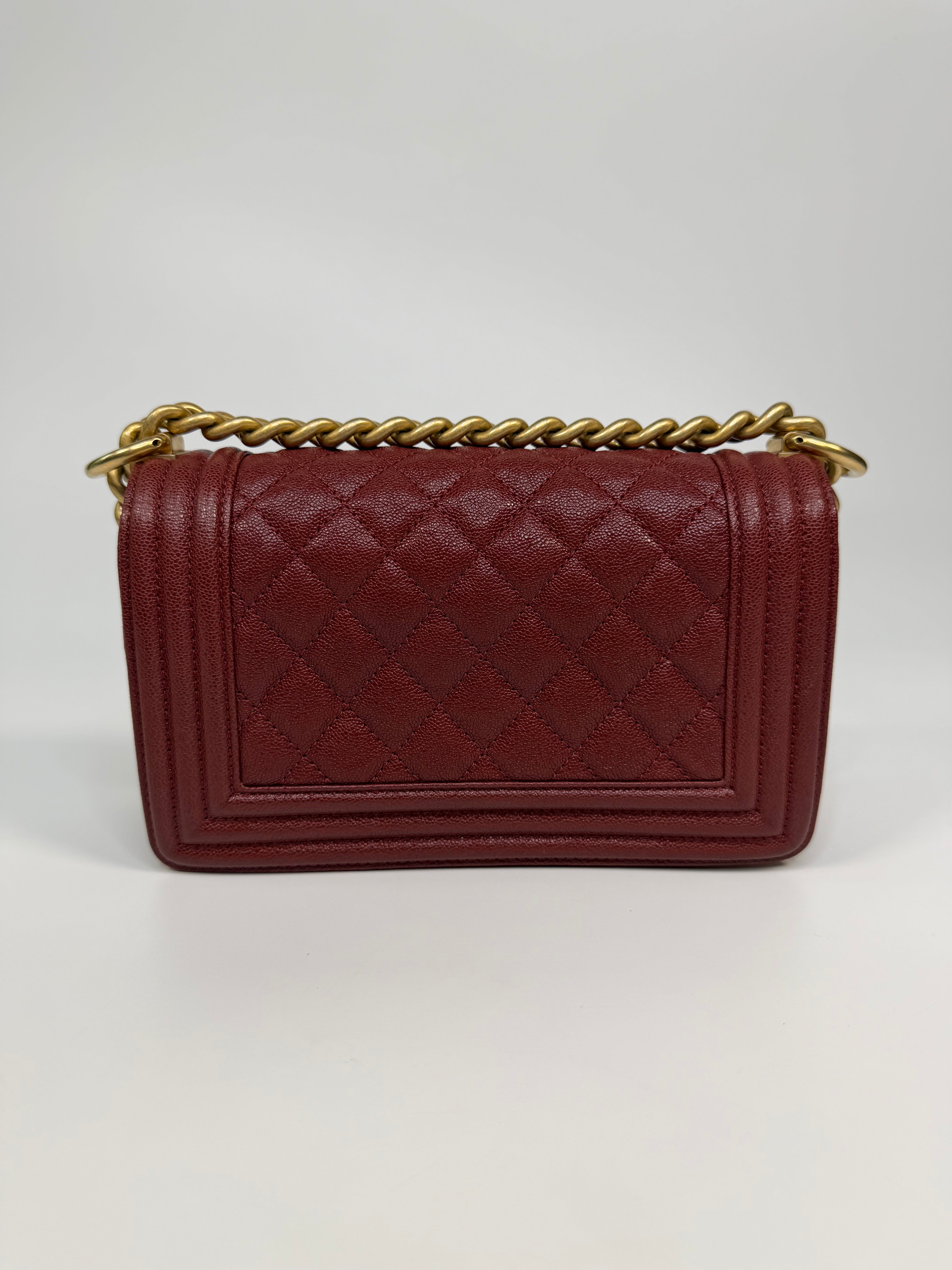 Chanel Le Boy Bag In Burgundy Caviar Leather Gold Hardware. Authentic and preloved in excellent condition.