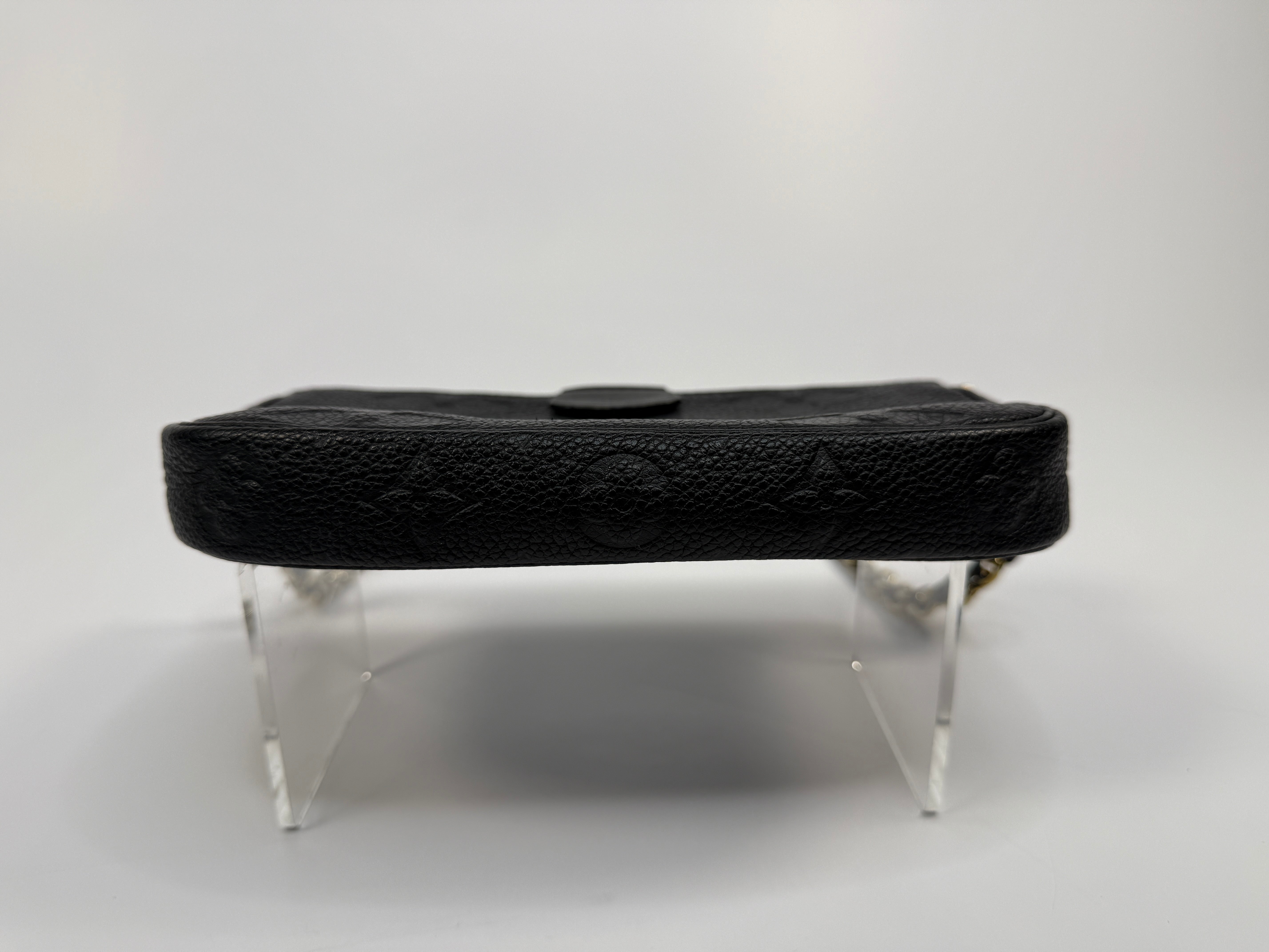 Black leather bag bottom view