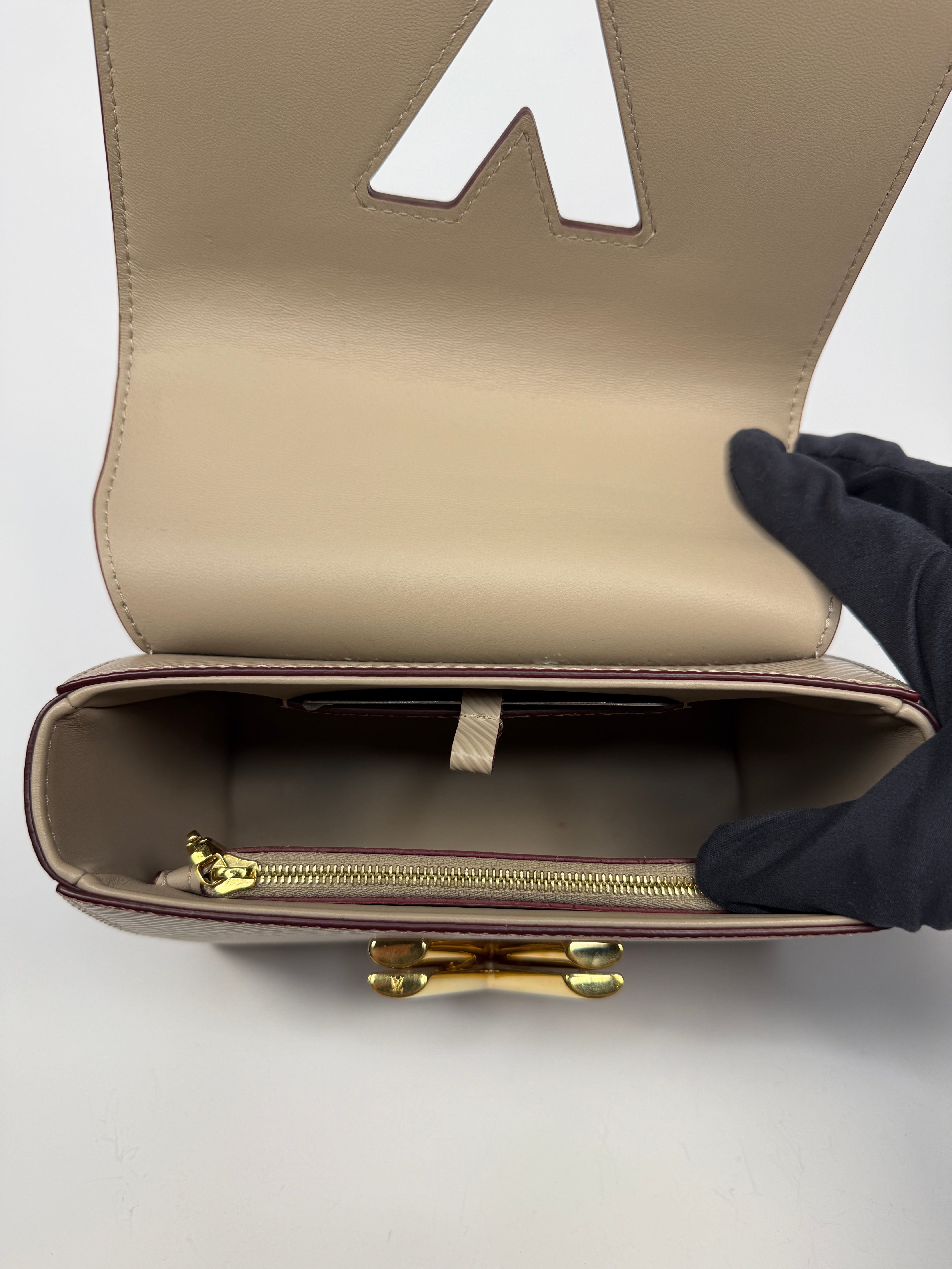 Louis Vuitton Twist PM Shoulder Bag In Beige leather with gold hardware. Authentic and pre loved excellent condition