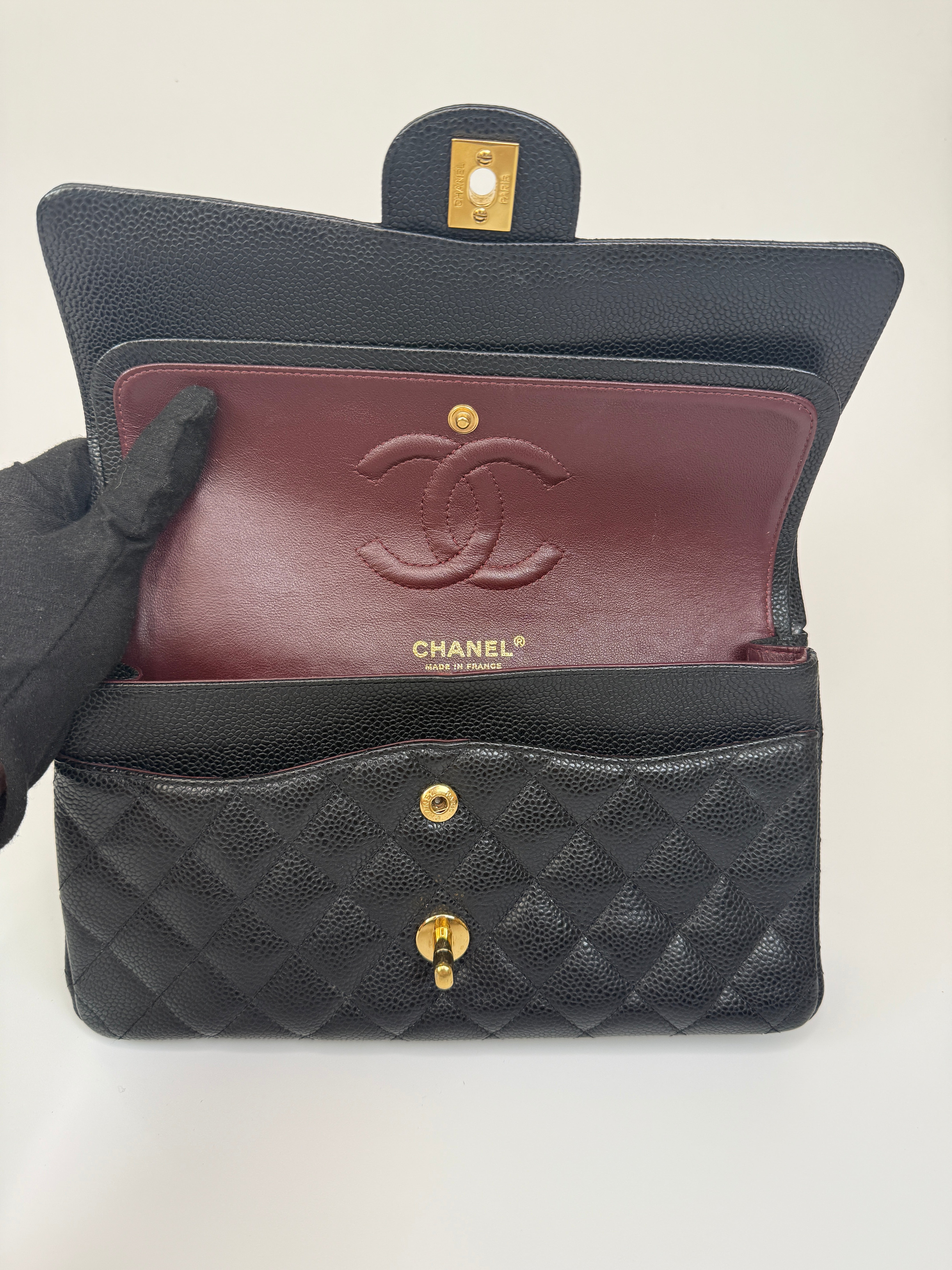 Chanel Medium Classic Double Flap Black Caviar Leather With Gold Hardware. Authentic and preloved. 100% Authenticity guarantee