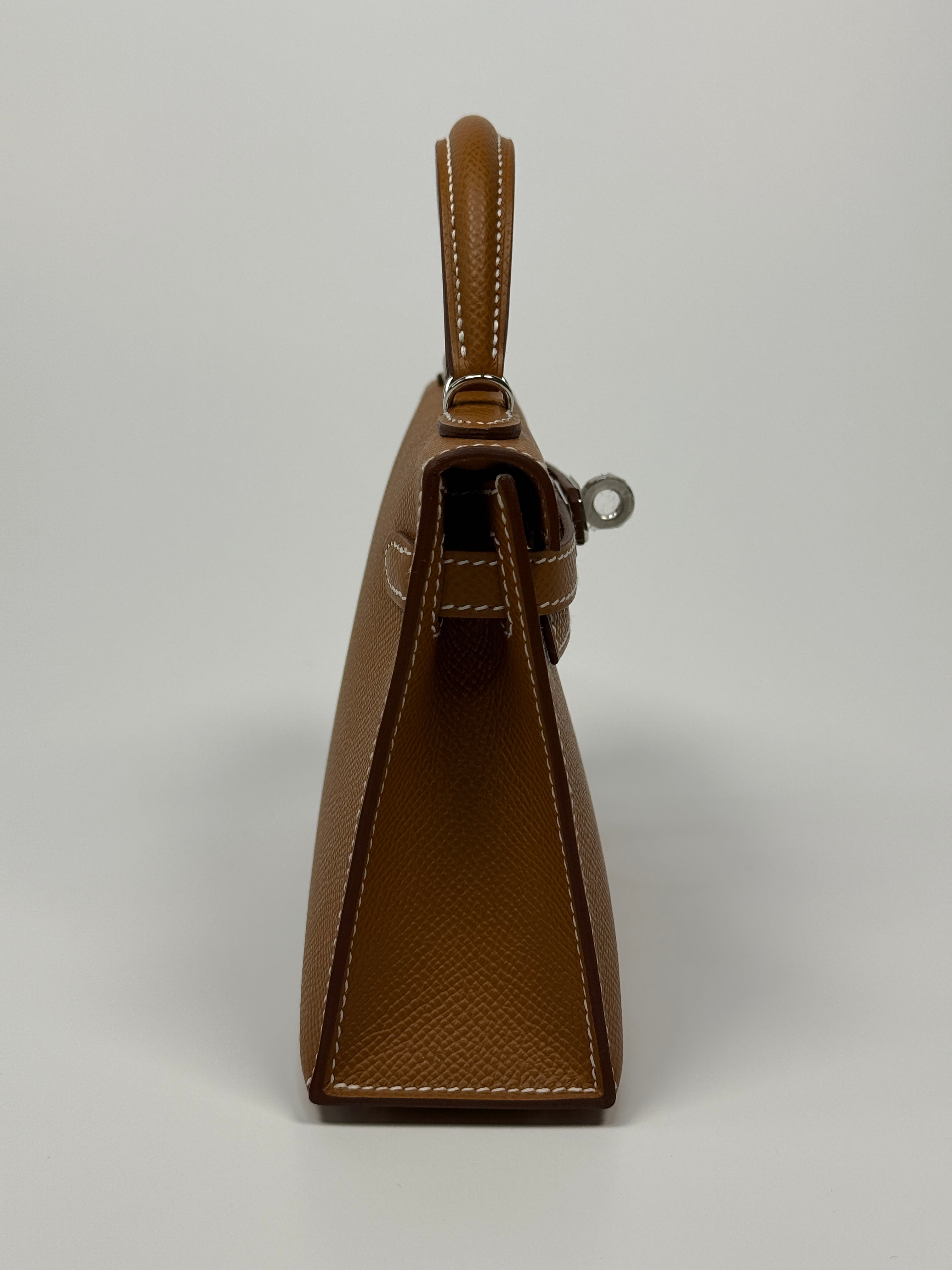 Hermès Mini Kelly Sellier In Gold Epsom Leather With Palladium Hardware New and unused Authentic and preloved