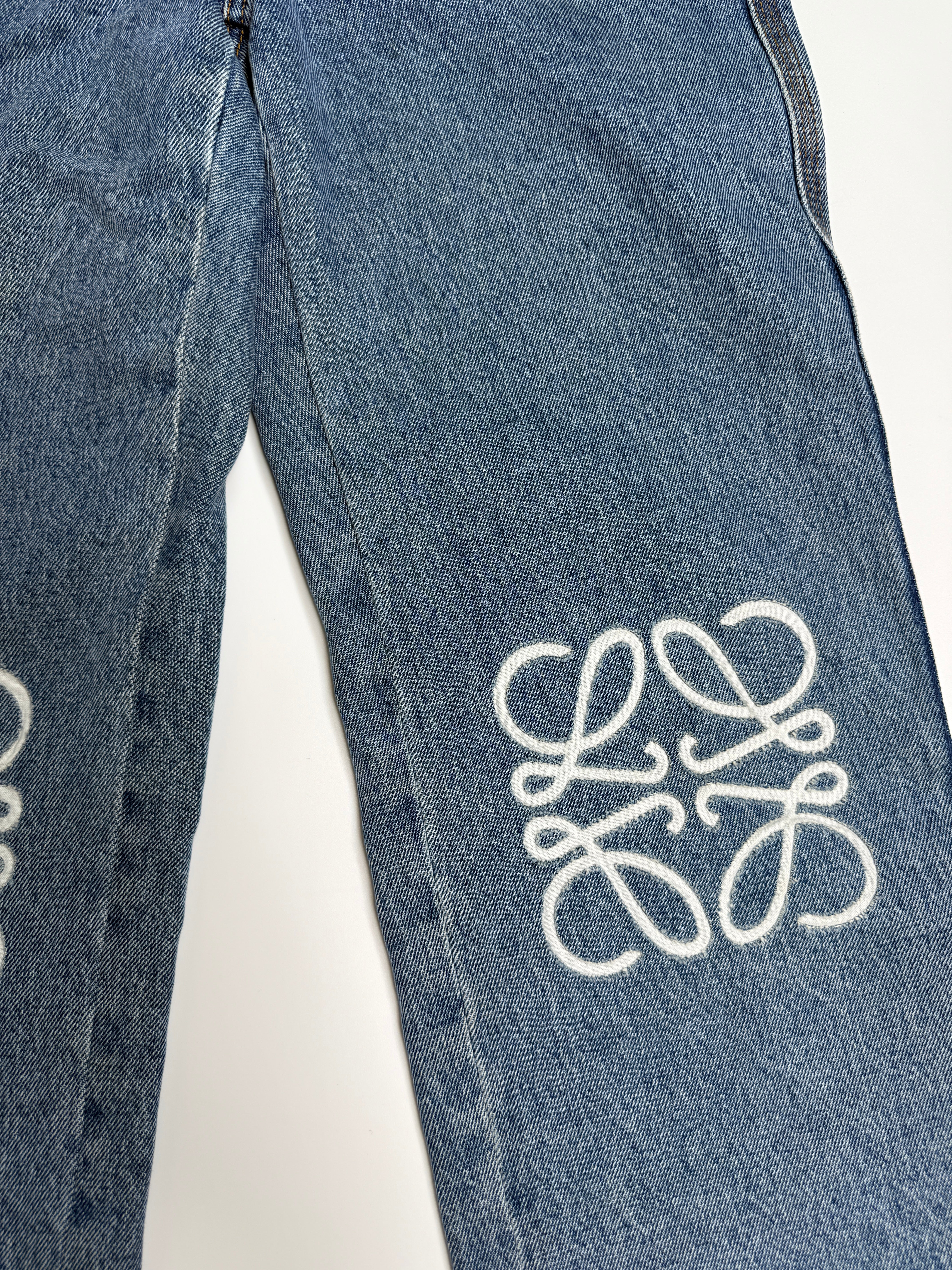 Authentic and preloved Loewe Anagram Denim Jeans (Size 36/UK8) In Blue Denim. Excellent Condition. Fully Insured next day delivery. Verified by Luxe Cheshire.