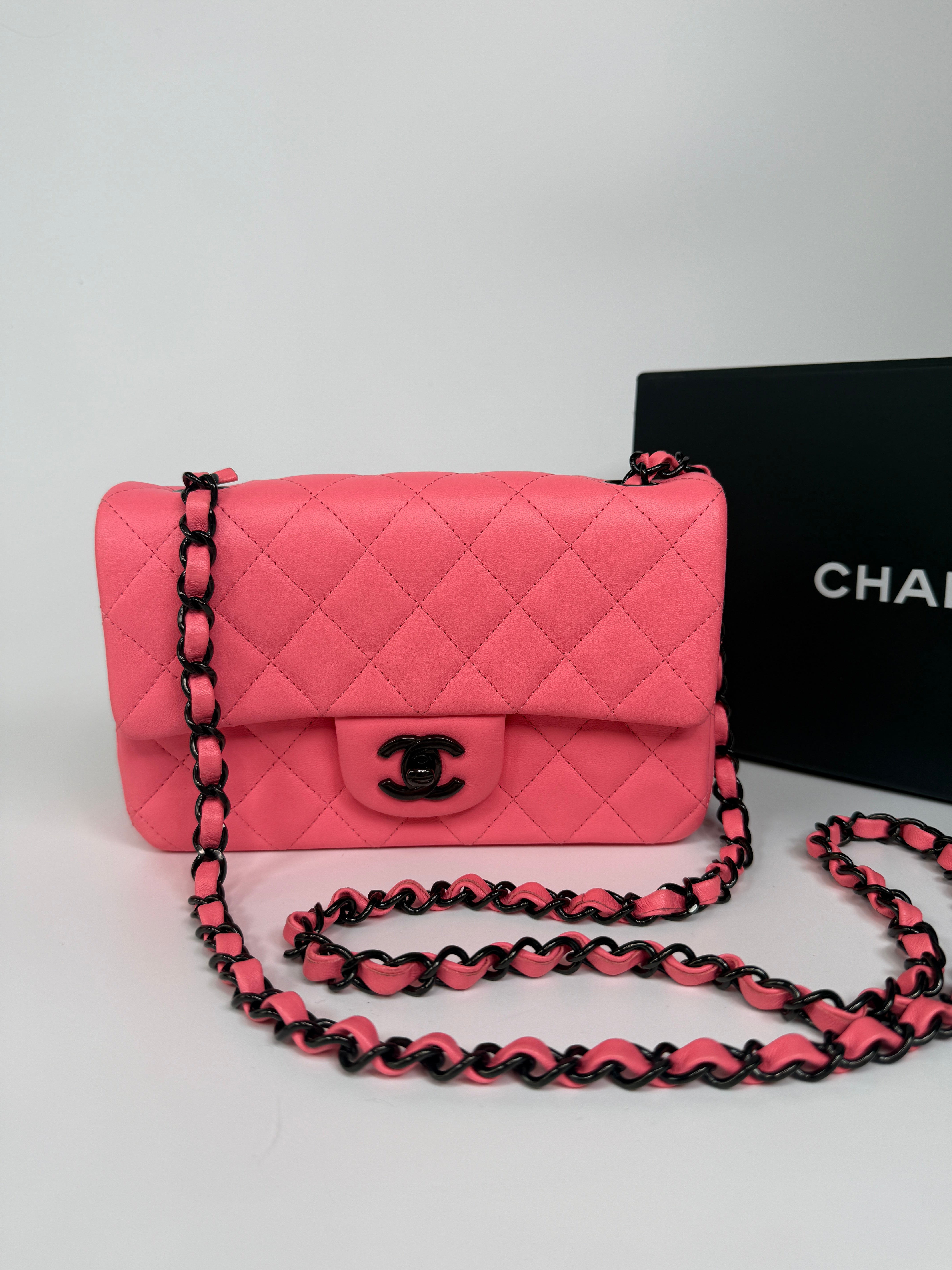 Chanel Mini Rectangle Flap Bag In Pink Lambskin With Black Hardware In Excellent Condition. Authentic and preloved.