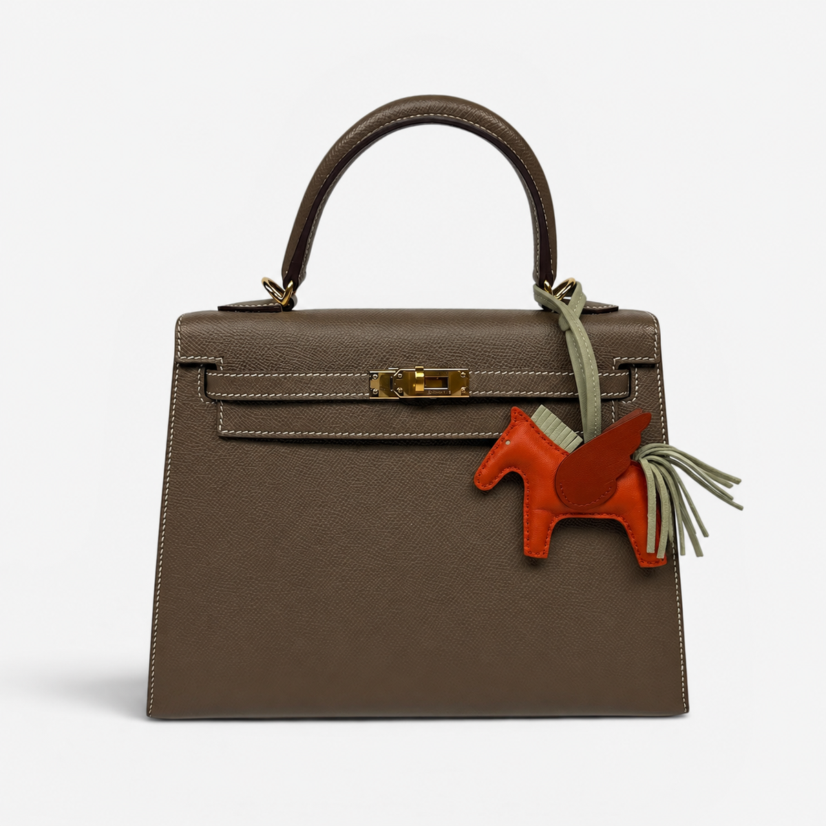 Hermès Rodeo Pegasus Charm In Orange Poppy, Craie & Terre Battue. 100% authentic and pre loved in excellent condition.