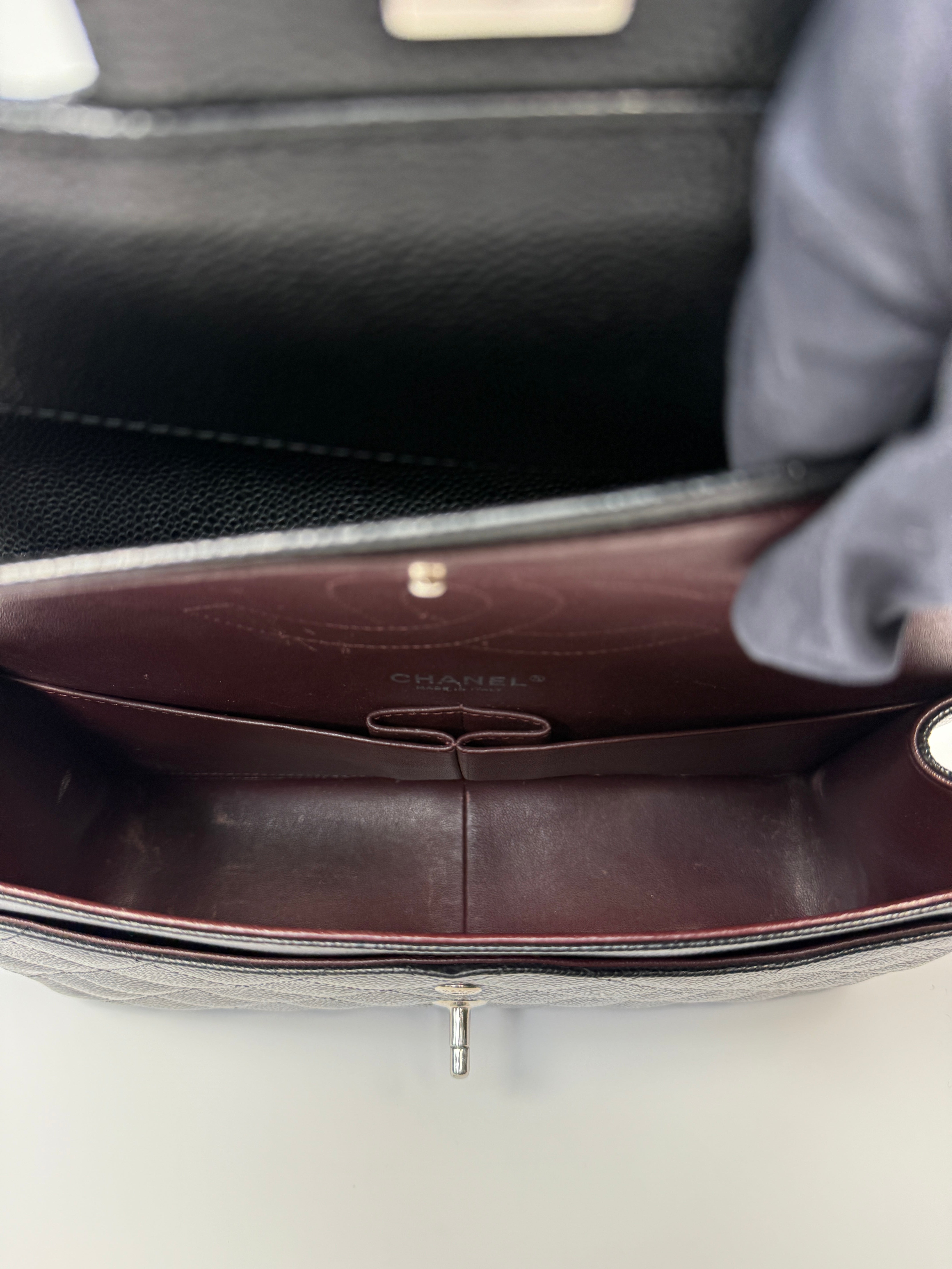 Chanel Black Caviar Leather Jumbo Classic Double Flap Silver Hardware
Pre Loved & Authentic