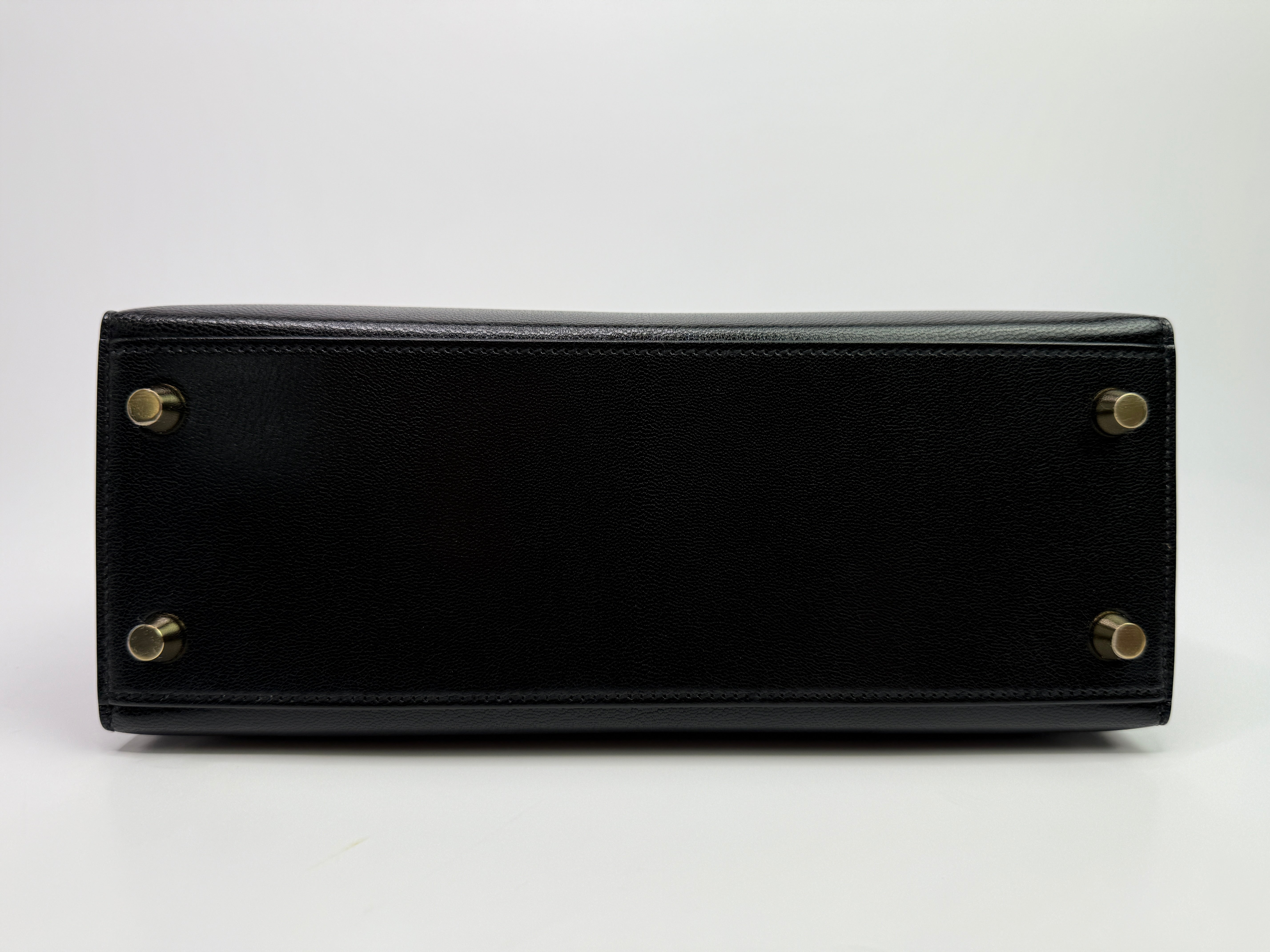 Authentic Pre Loved Hermès Kelly 25 Sellier In Black Chevre Chamilka Leather with Yellow Gold Hardware New & Unused Condition