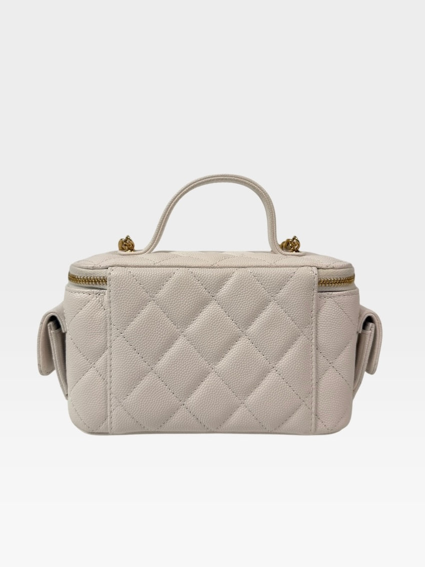 Chanel Vanity Top Handle Multi Pockets In White Caviar Leather With Gold Hardware. 100% authentic and preloved in excellent condition