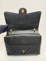 Chanel Maxi Classic Double Flap In Black Caviar Leather With GHW