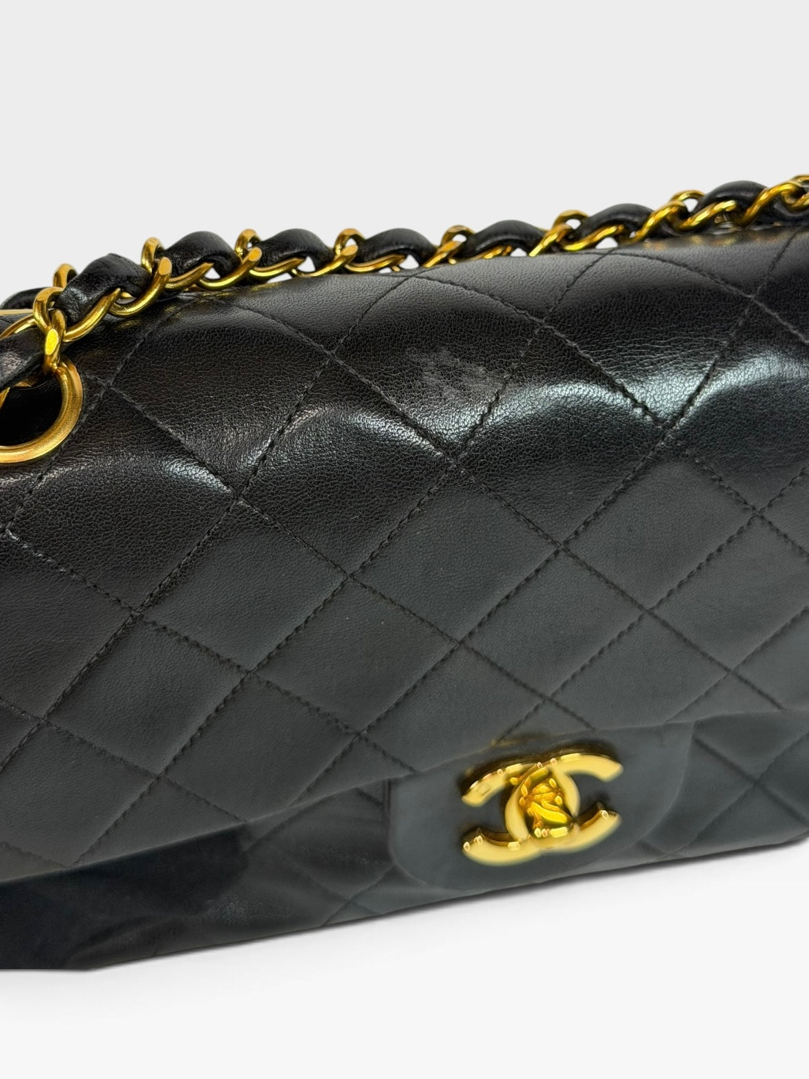Chanel Vintage Small Classic Double Flap In Black Lambskin Leather 24Kt Hardware. Authentic and preloved in excellent condition. 100% guarantee