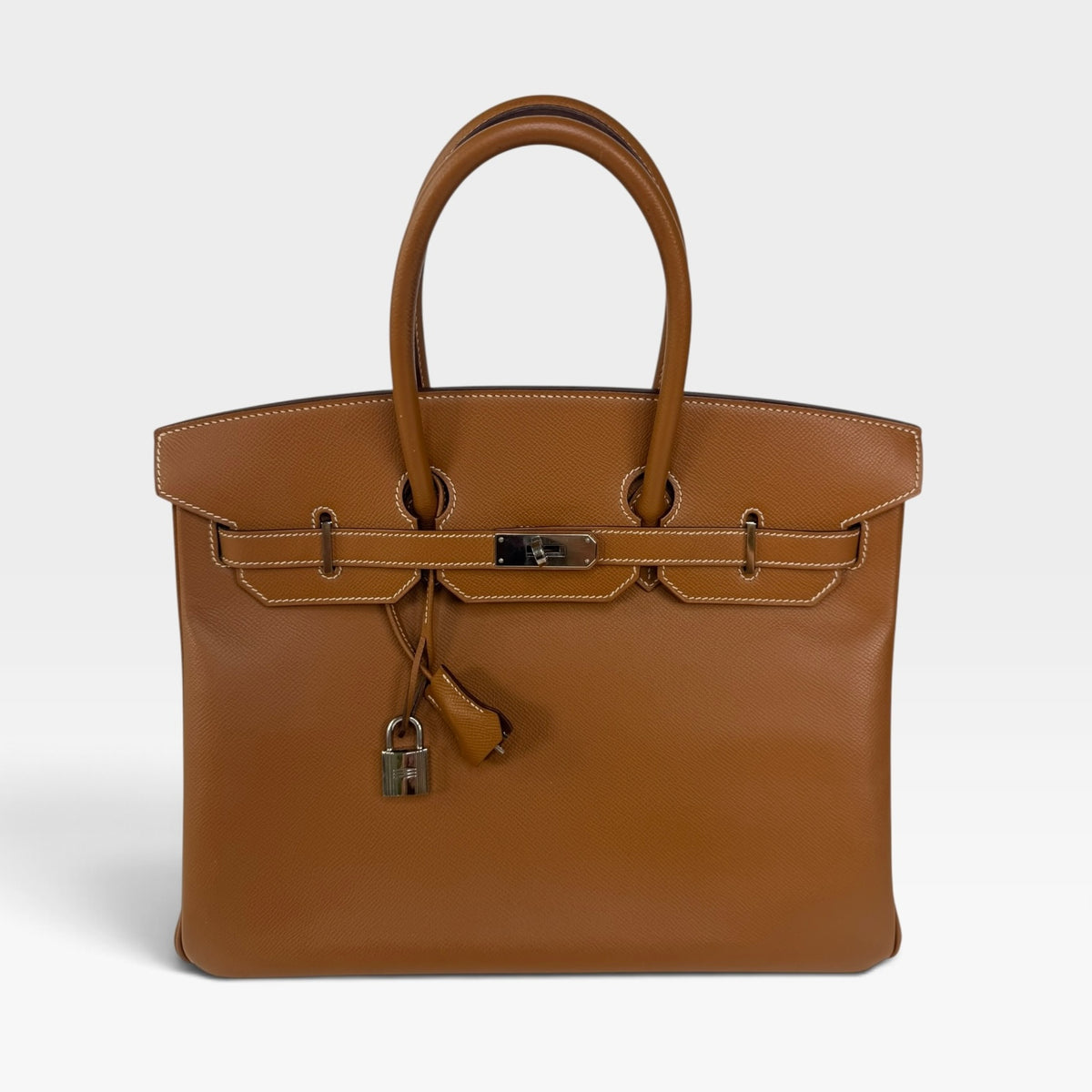 Hermès Birkin 35 In Gold Epsom Leather With Palladium Hardware. Authentic and preloved in very good condition. 100% Guarantee