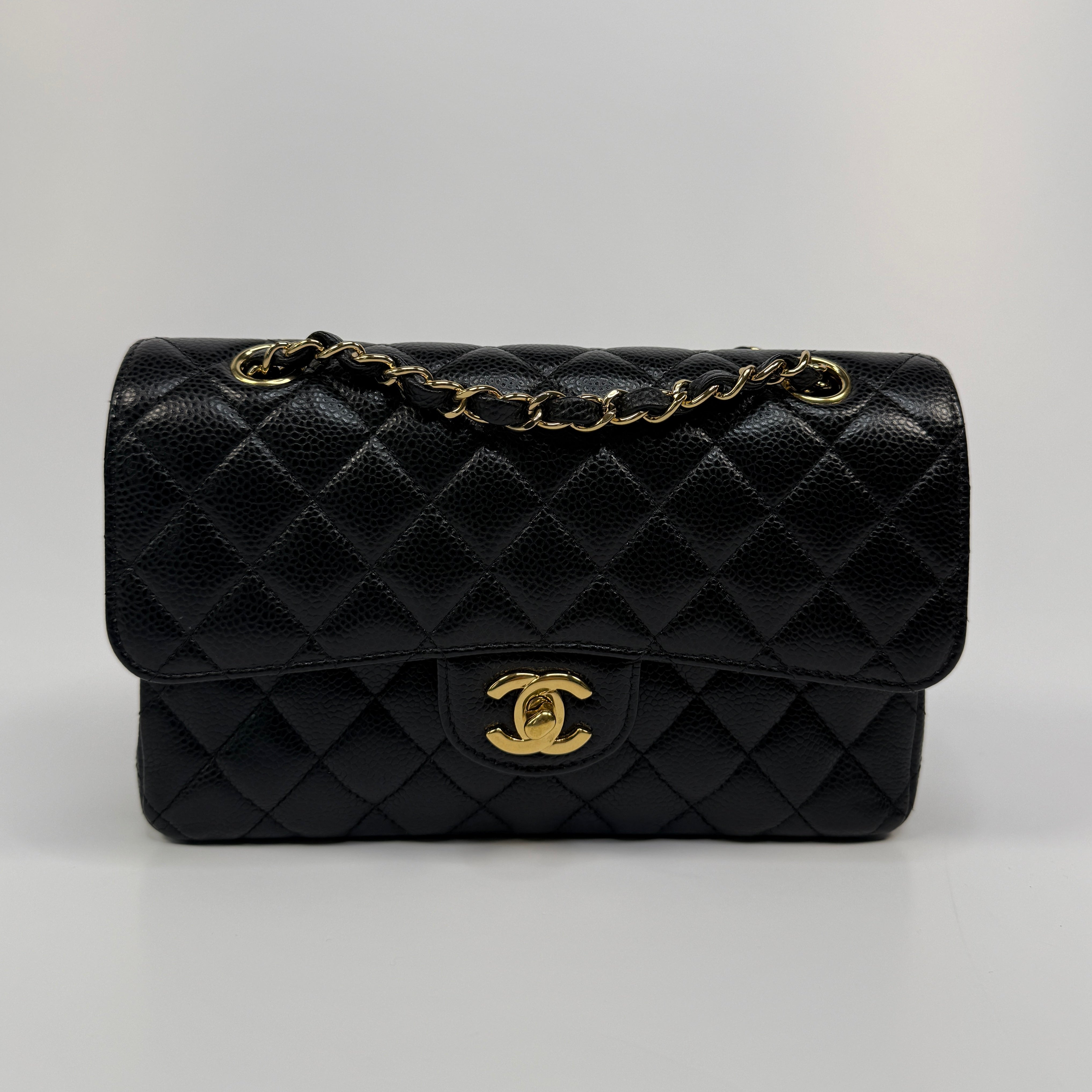 Chanel Small Classic Double Flap In Black Caviar Leather With Gold Hardware
Pre Loved & Authentic