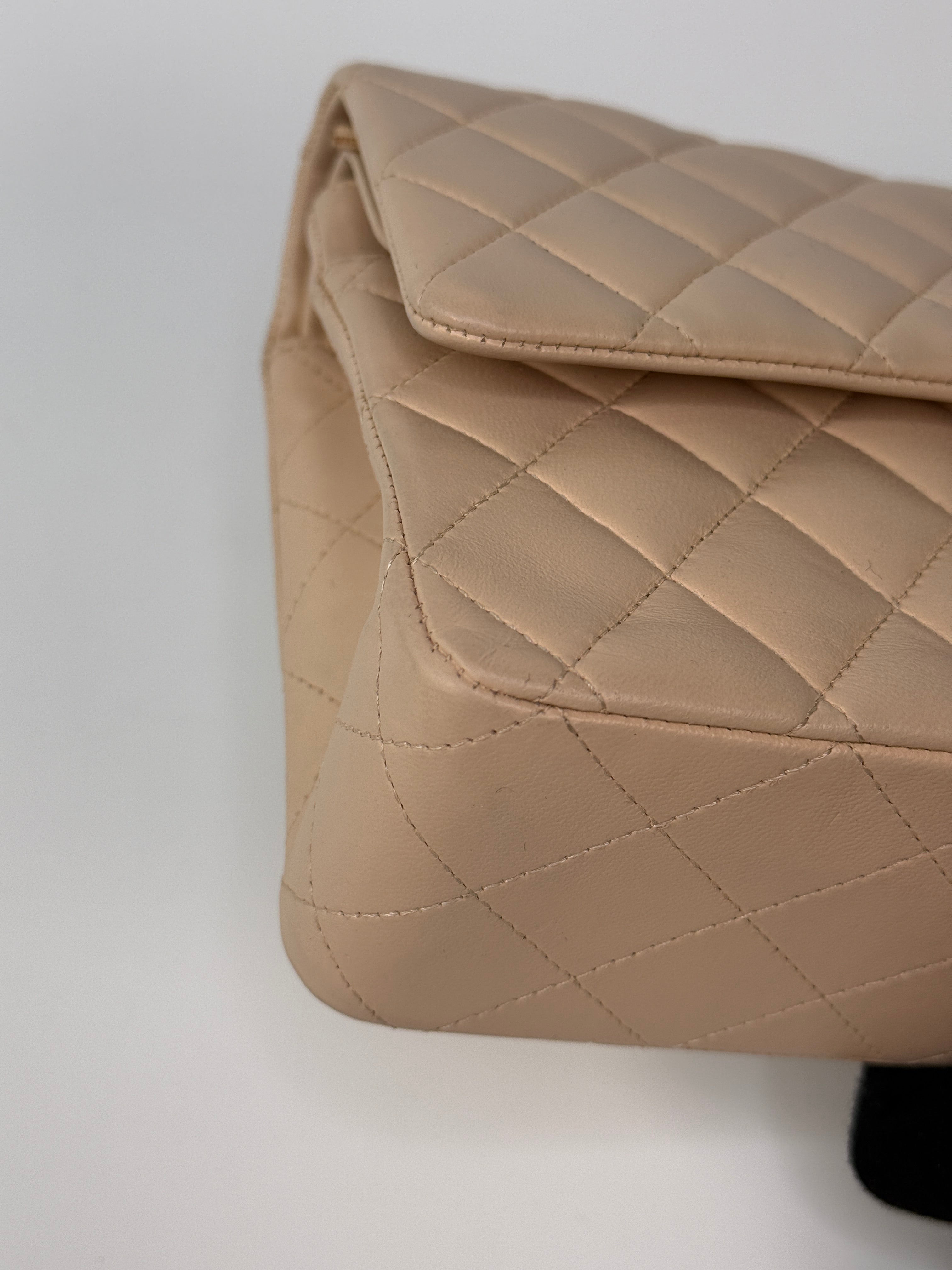 Authentic and preloved Chanel Medium Classic Double Flap Light Beige Lambskin Leather With Silver Hardware