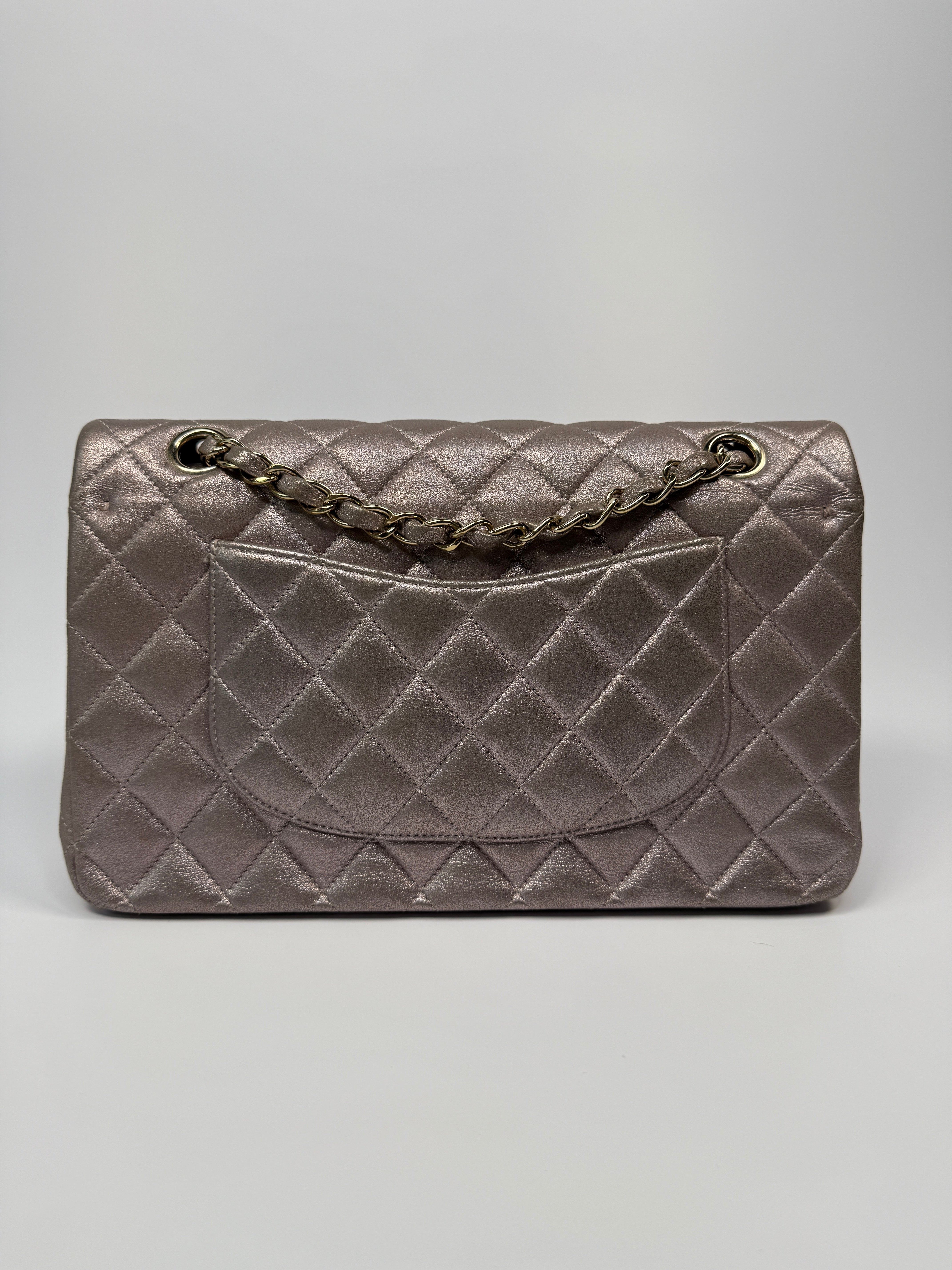 Authentic pre-loved Chanel Iridescent Rose Medium Classic Double Flap With Gold Hardware.