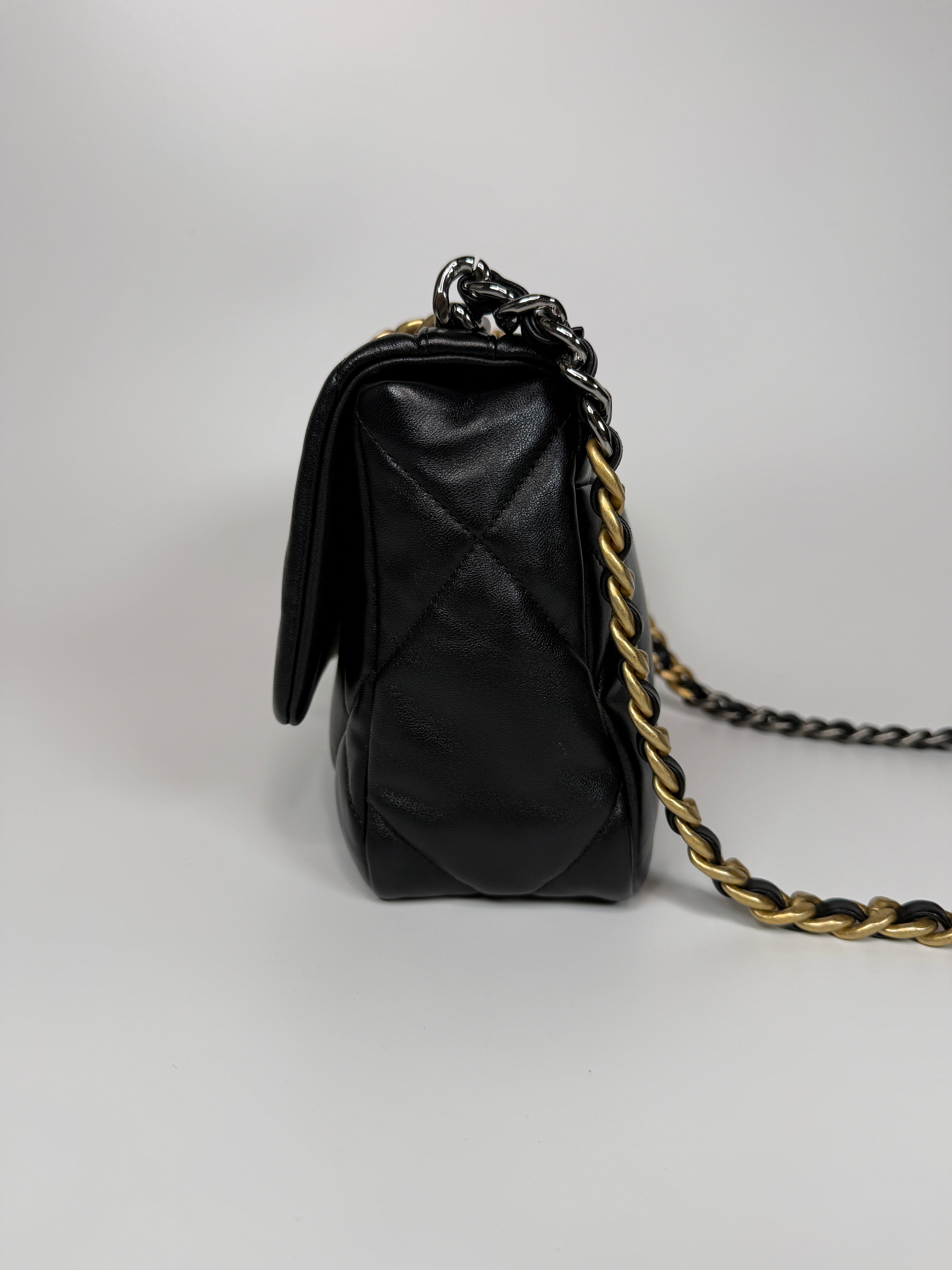 Authentic and preloved Chanel 19 Small In Black Lambskin Leather Mixed hardware. Excellent condition. 100% Authenticity guarantee