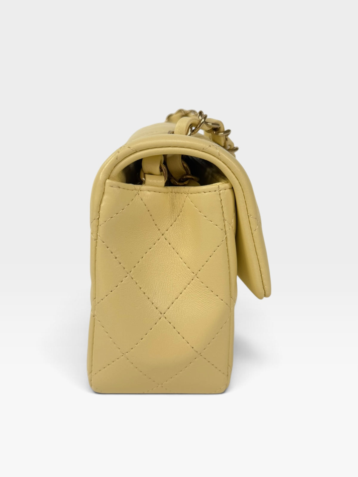 Chanel Mini Rectangle In Yellow Lambskin Leather With Gold Hardware. 100% authentic and preloved in excellent condition