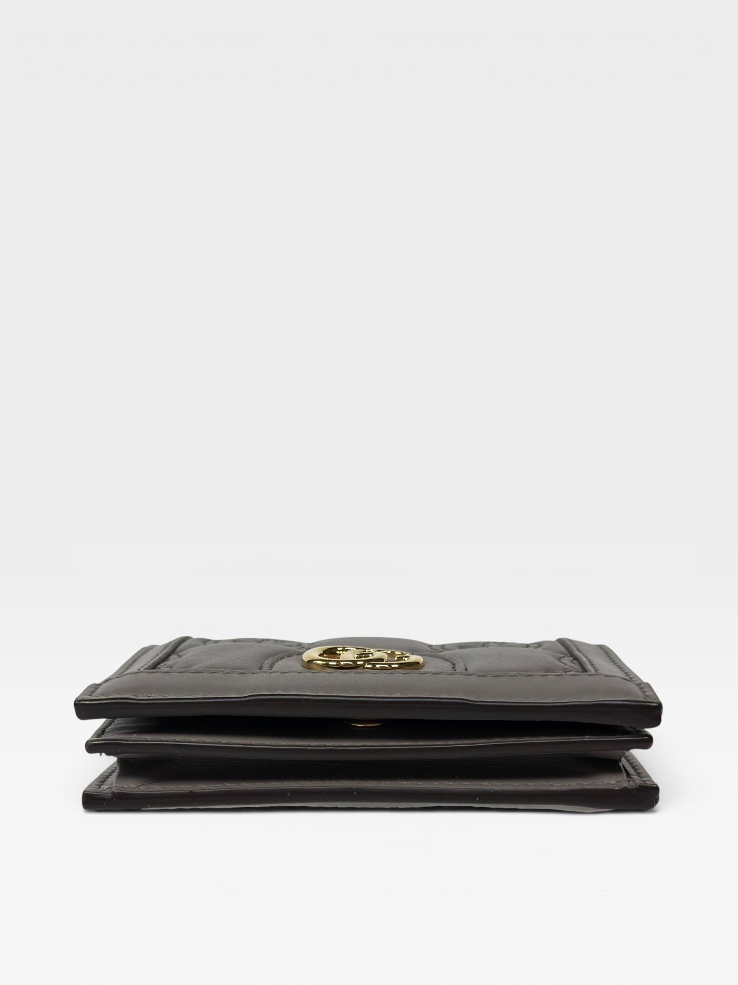 Gucci GG Embossed Wallet In Grey Leather With Gold Hardware. Authentic and preloved in excellent condition.
