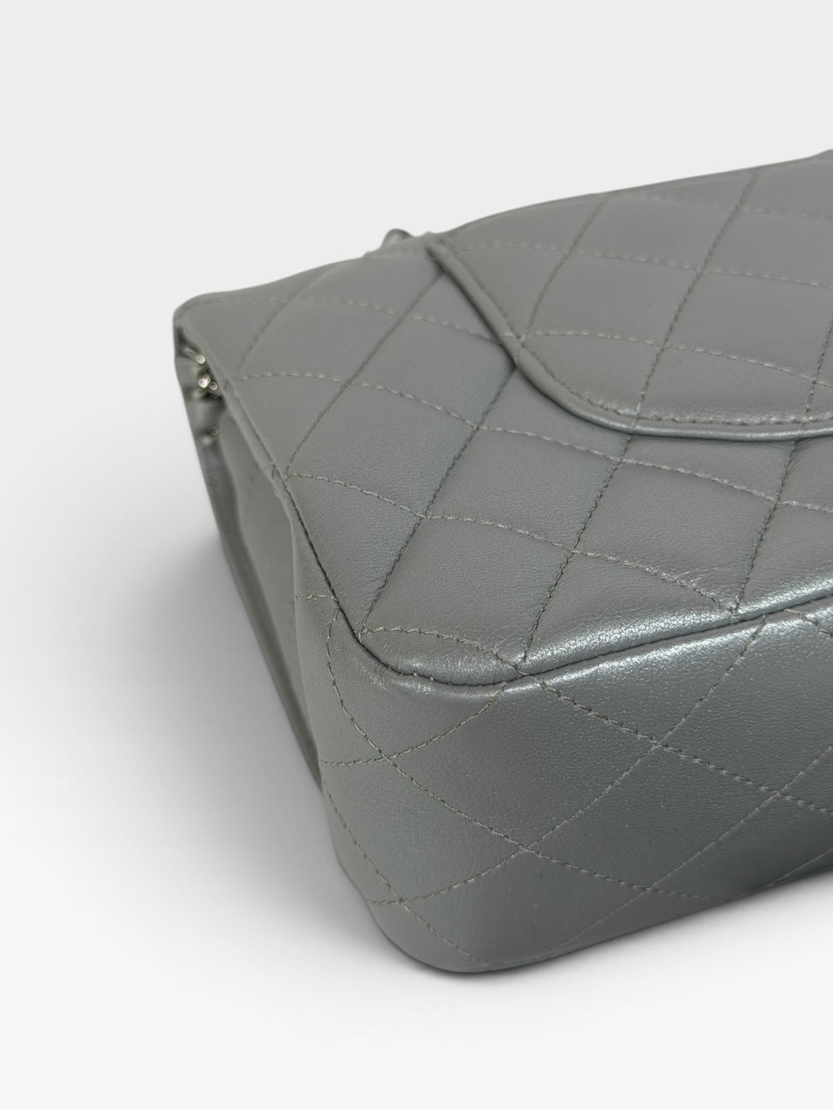 Chanel Medium Classic Double Flap In Silver Lambskin Leather Silver Hardware. 100% authentic and preloved in excellent condition