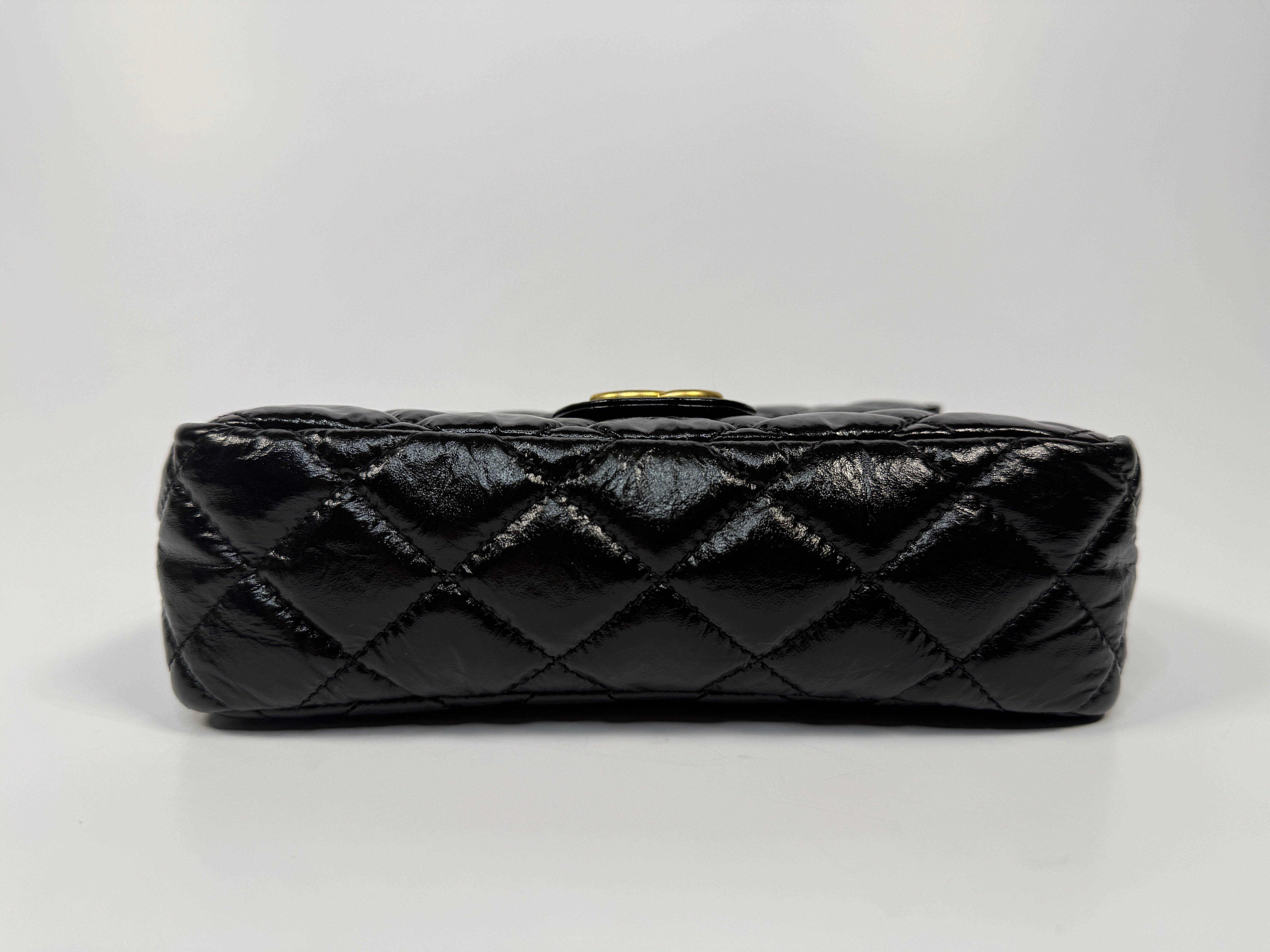 Chanel Mini Quilted Medallion Shoulder Bag In Black Calfskin With Gold Hardware. Authentic and preloved. Excellent condition.
